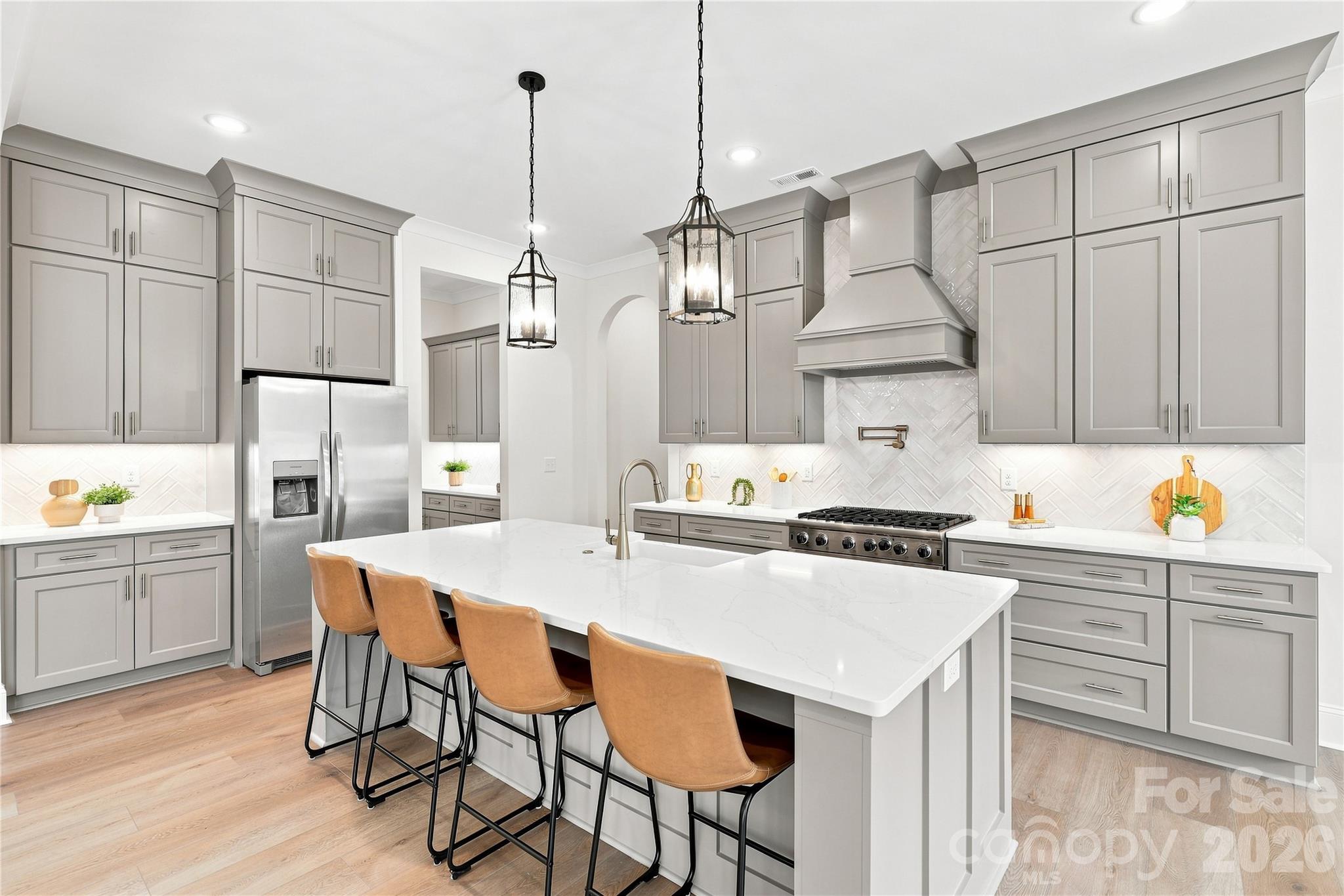 Kitchen showing cabinets to ceiling (optional upgrade) - 509 Simpson Road, Locust