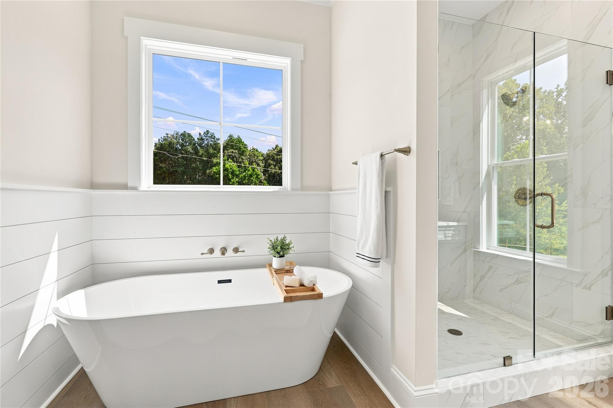 Free-standing soaking tub included in primary bath - 509 Simpson Road, Locust