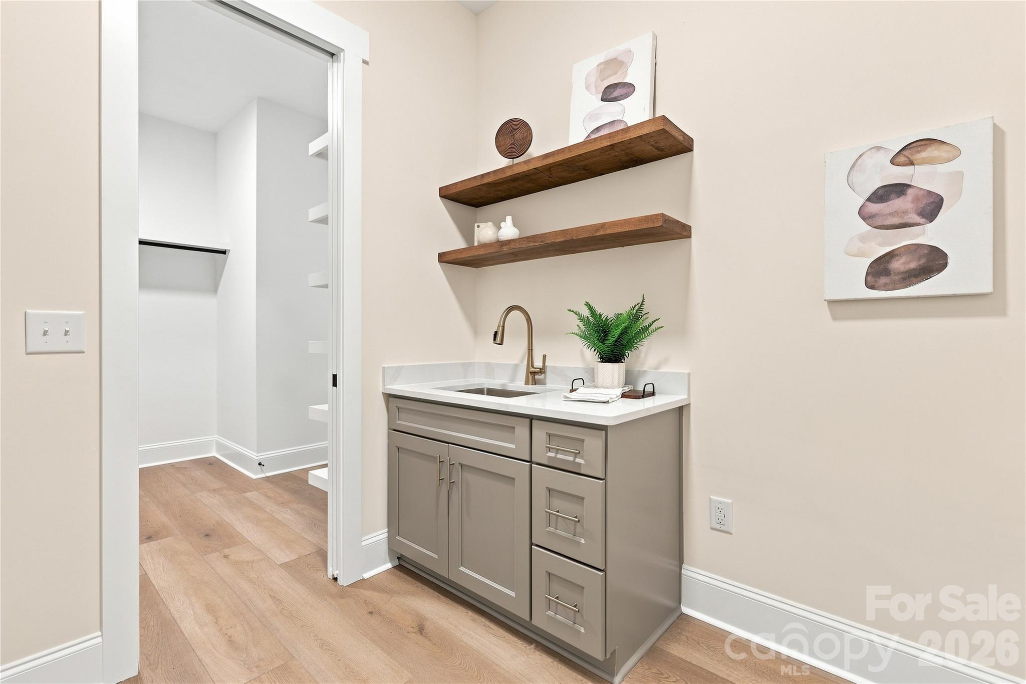 Laundry room connects to primary closet (Shown as included) - 509 Simpson Road, Locust