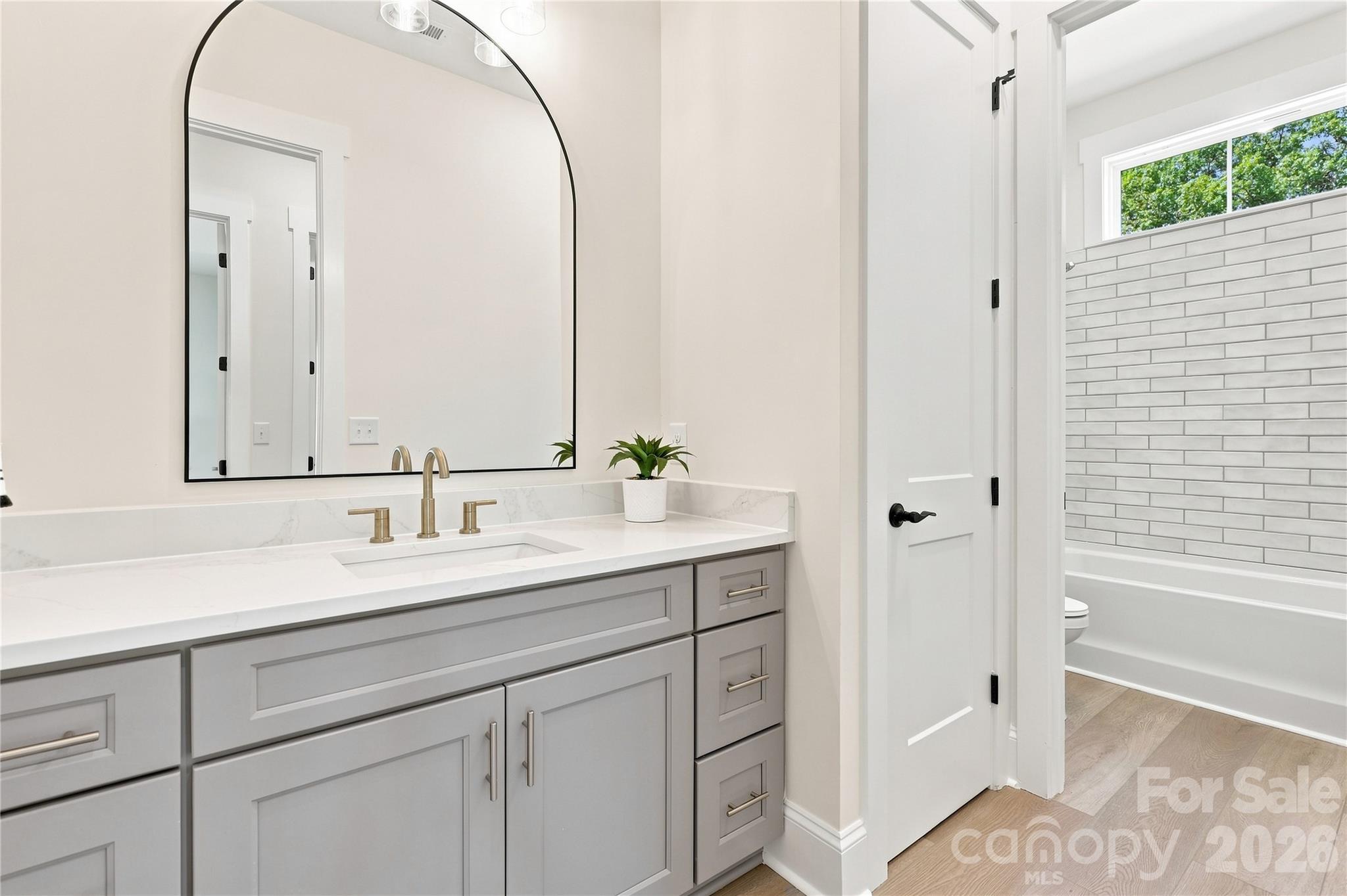 Full hall bath w/linen closet (shown as included) - 509 Simpson Road, Locust