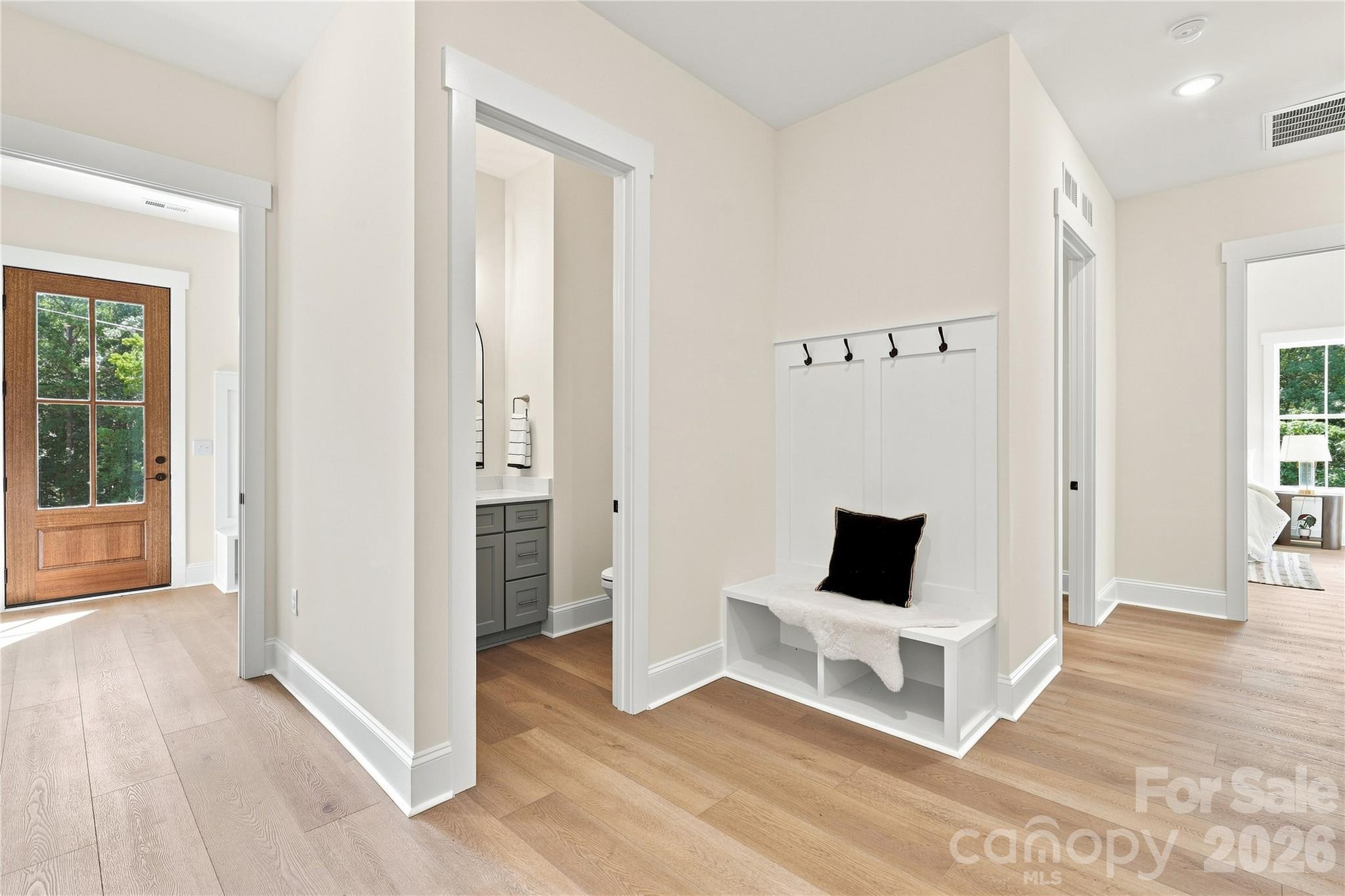 Drop Zone #2 near half bath and mudroom and garage entrance (Shown with incuded features) - 509 Simpson Road, Locust