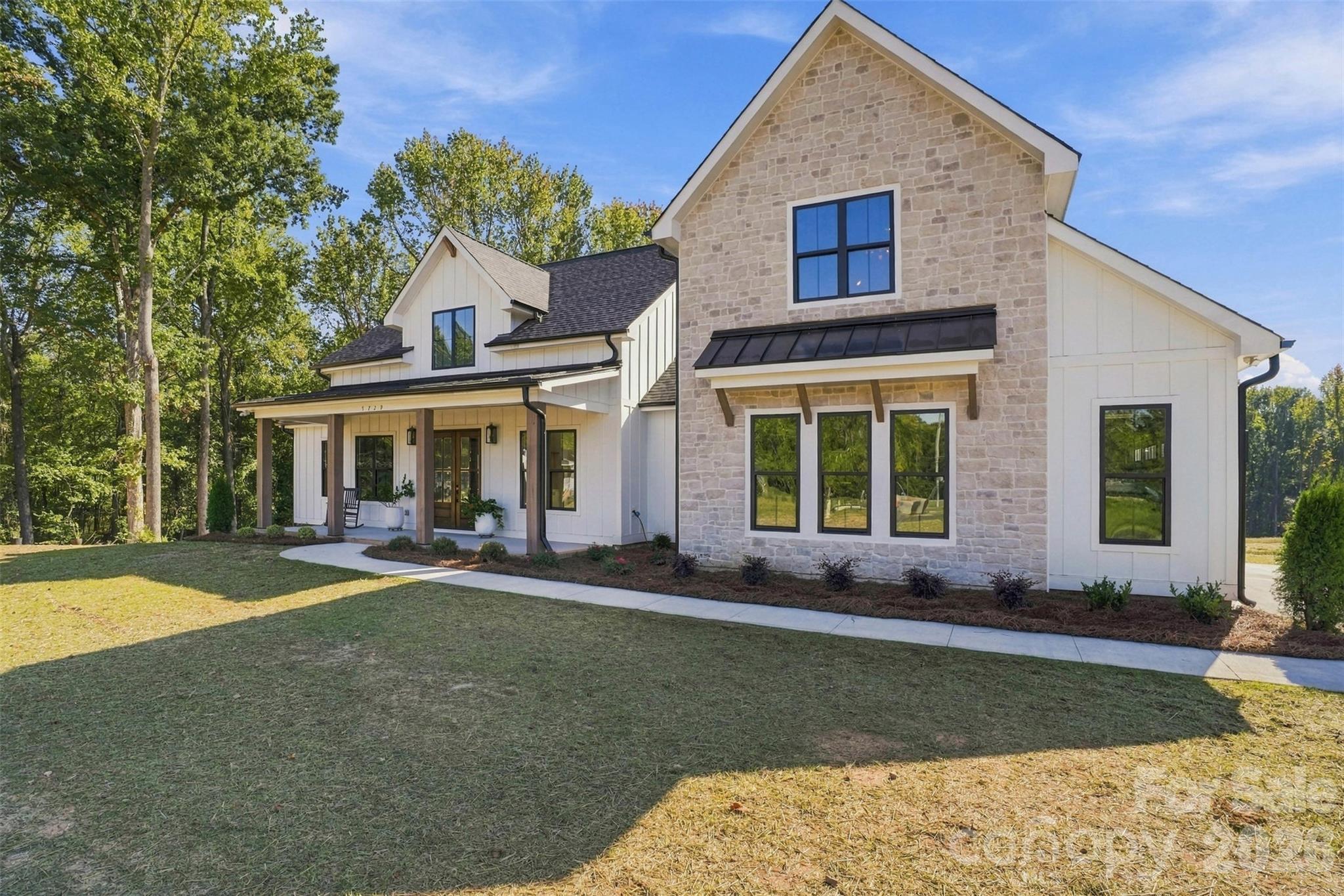 Previously built Arbor with optional stone facade and metal roof accent - 509 Simpson Road, Locust