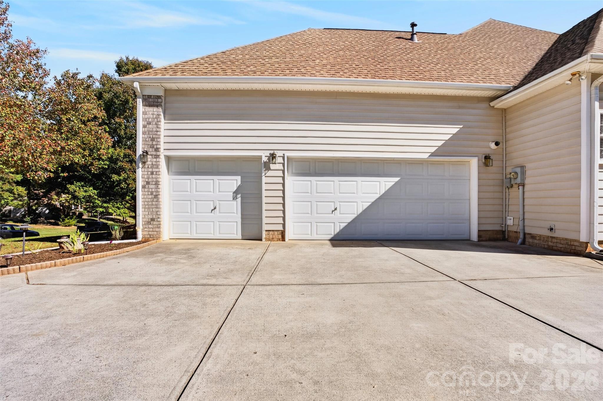 Side load 3 car garage. - 170 Herons Gate Drive, Mooresville