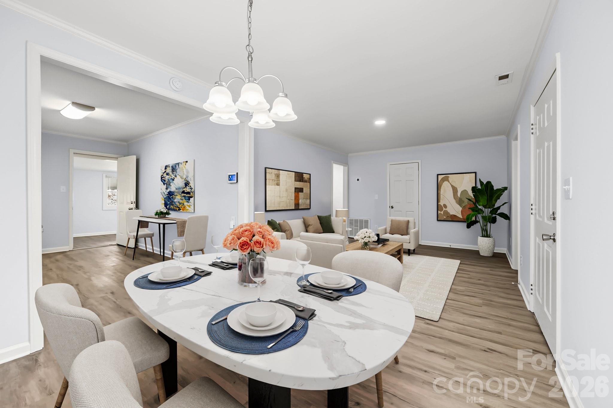 Large living room that opens to the dining area and kitchen - 2018 Quentin Street, Charlotte