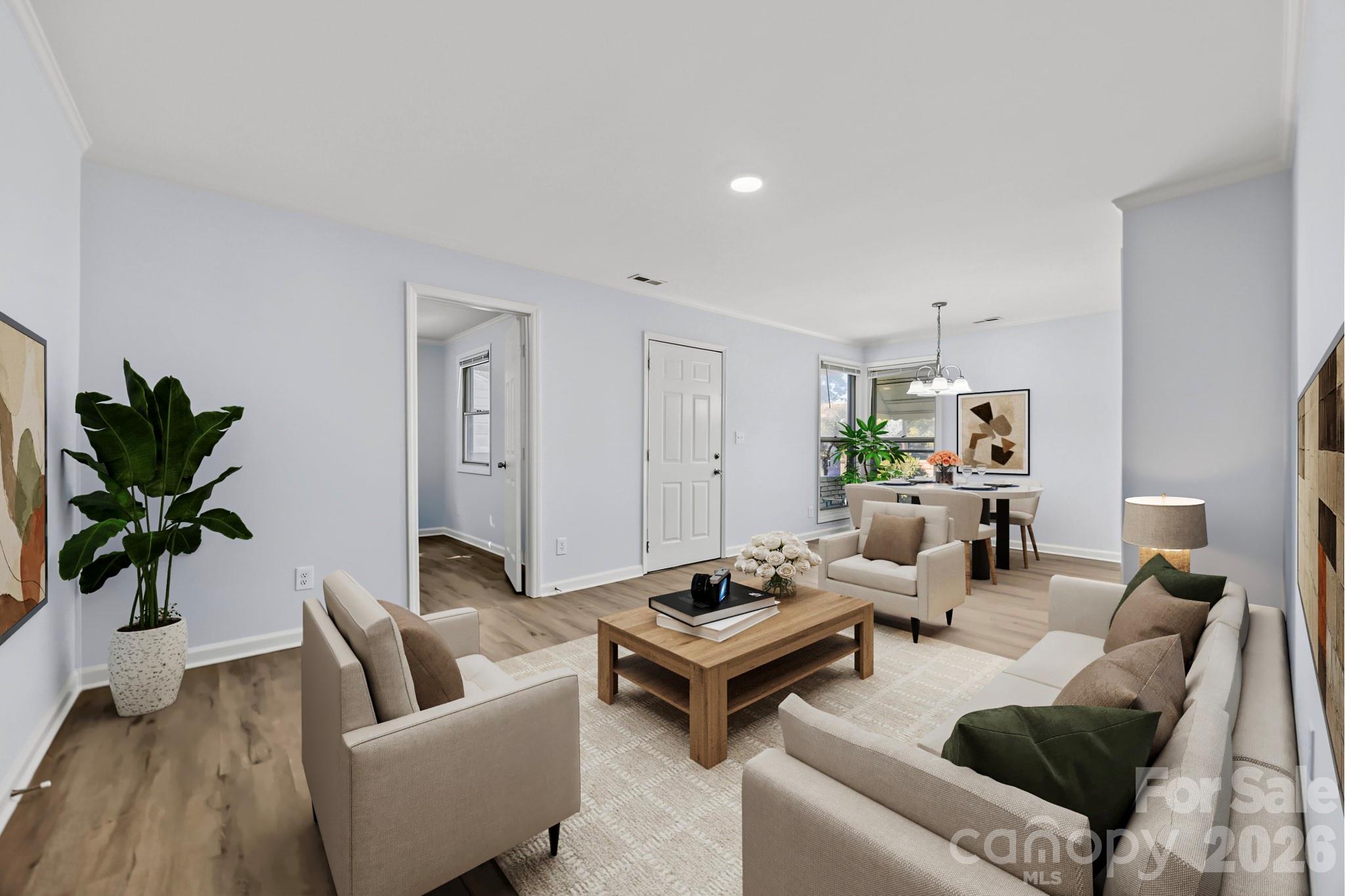 Large living room that opens to the dining area and kitchen - 2018 Quentin Street, Charlotte