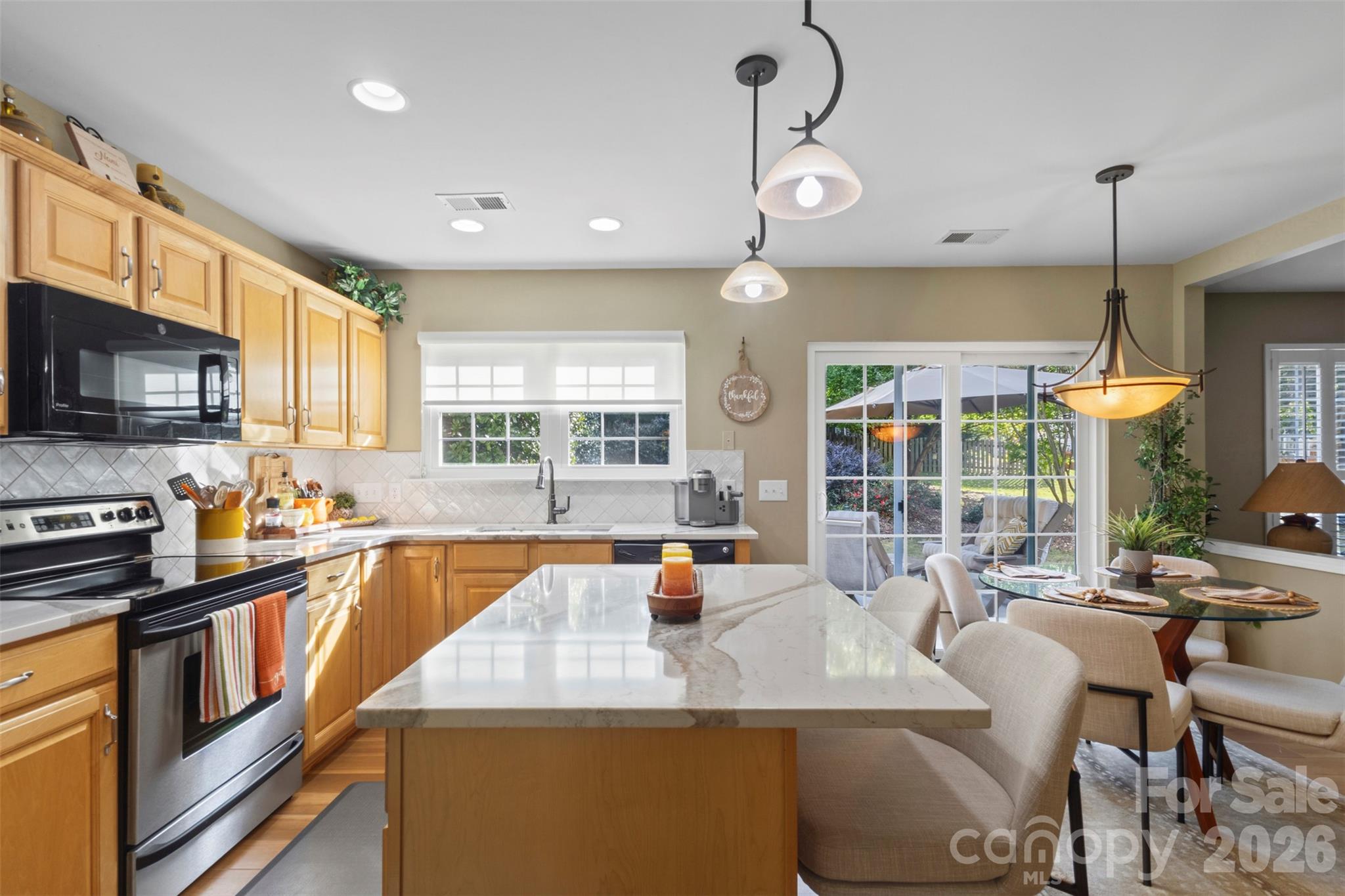 Updated light fixtures throughout the kitchen - 18912 Harbor Cove Drive, Cornelius