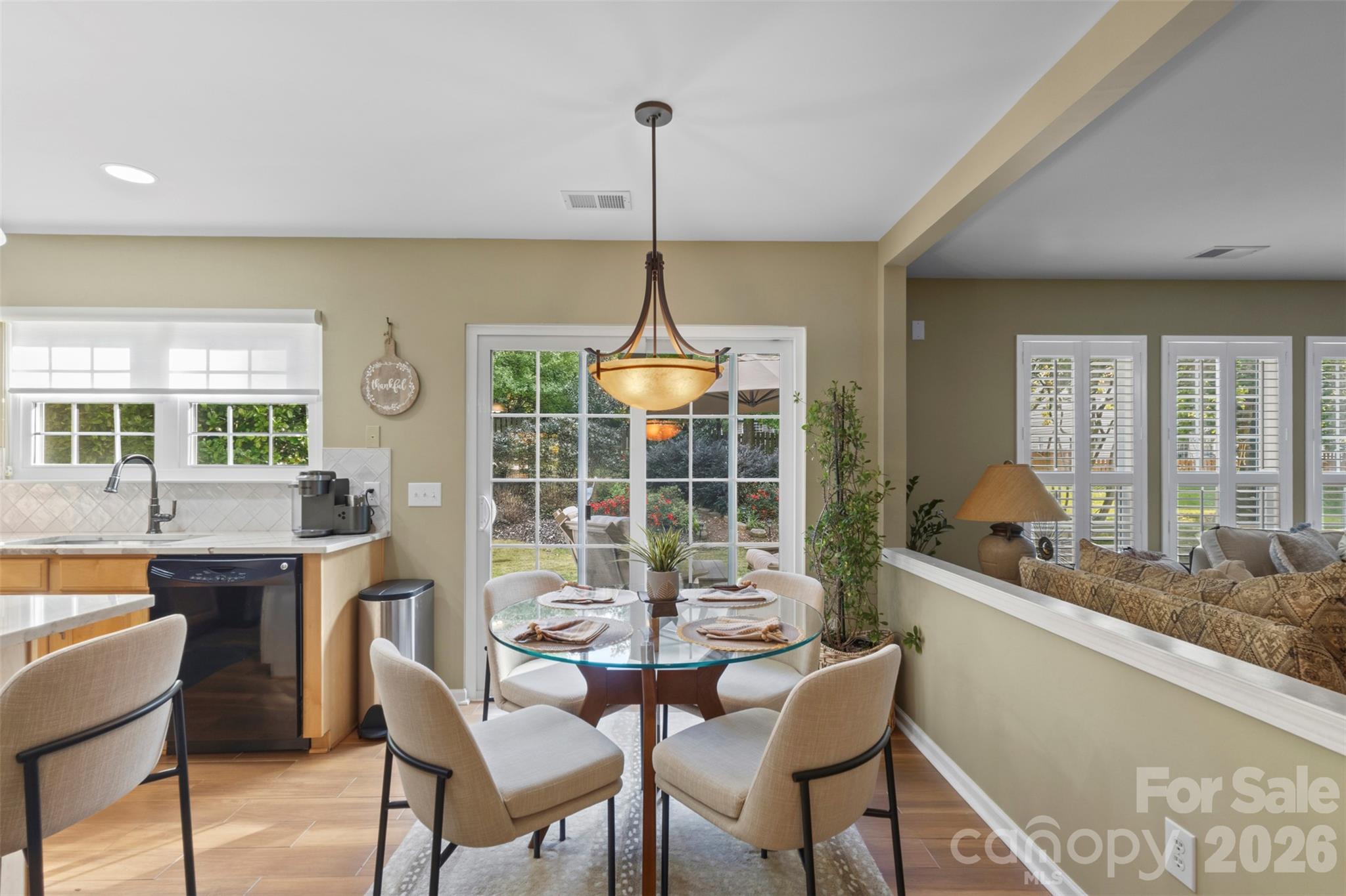 New windows and sliders, leading to the backyard - 18912 Harbor Cove Drive, Cornelius