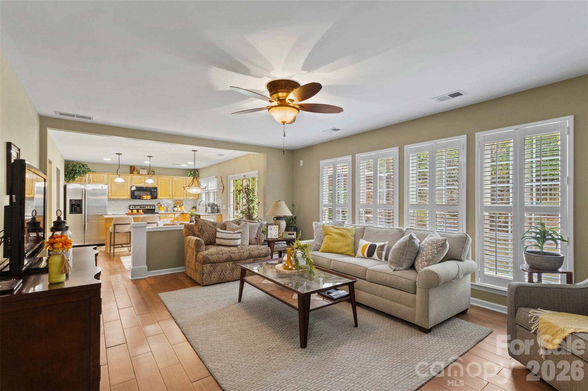 Great natural light filtered through the plantation shutters throughout the home - 18912 Harbor Cove Drive, Cornelius
