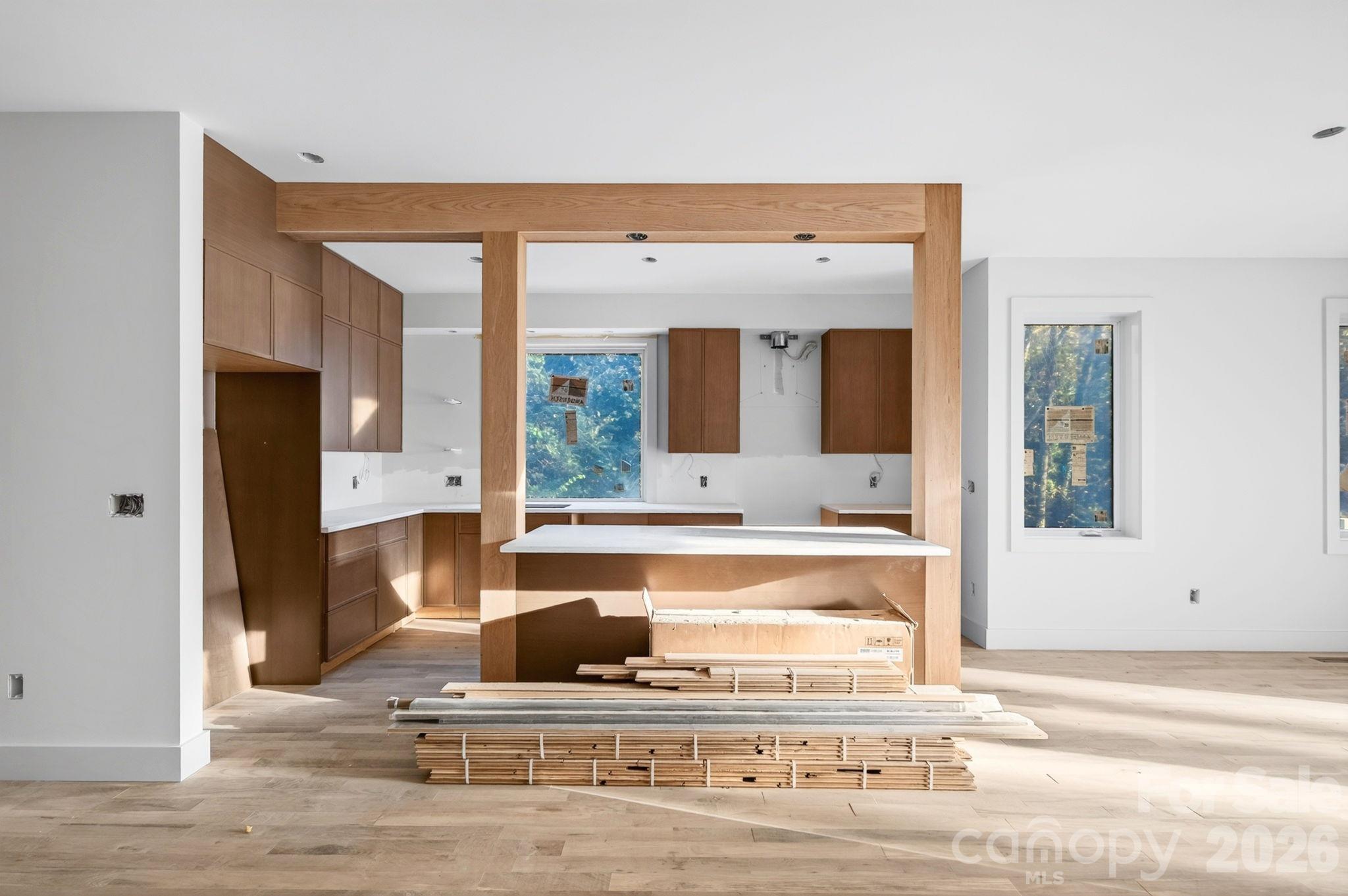 Modern Kitchen Framed by Decorative Wood Column Bookends and Ceiling Beam - 310 Pearson Drive, Asheville