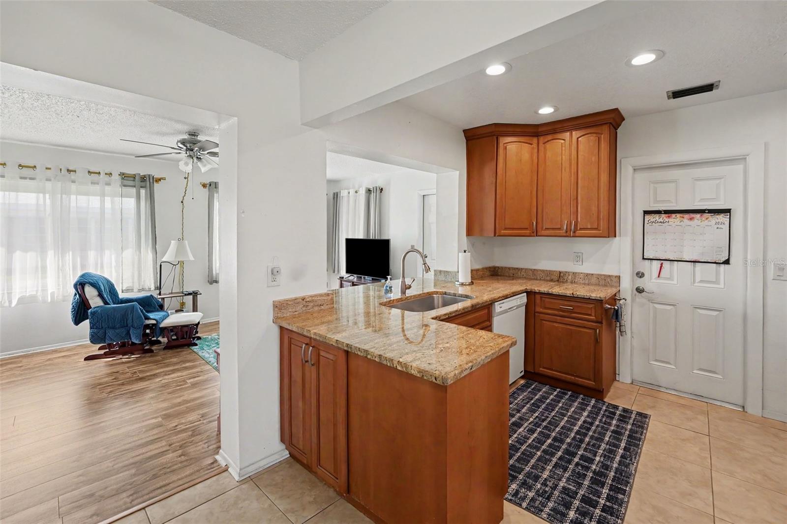 Kitchen with Solid Wood Cabinets - 3474 101ST TER N, PINELLAS PARK