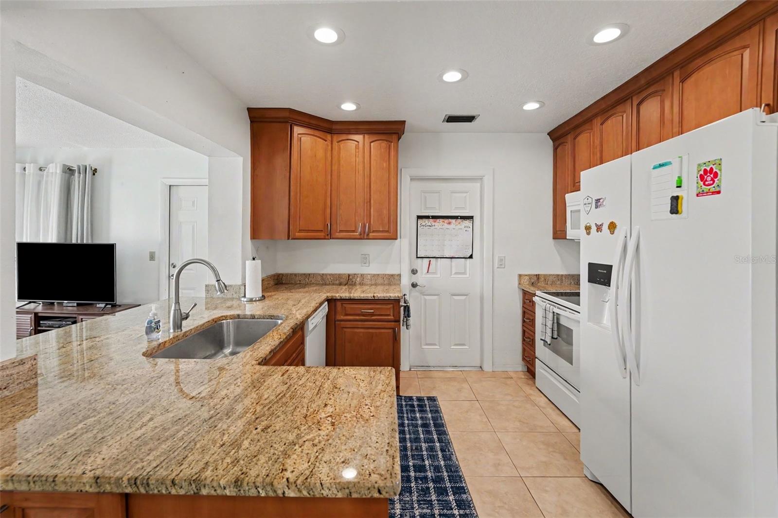 Kitchen with Granite Counter Tops - 3474 101ST TER N, PINELLAS PARK