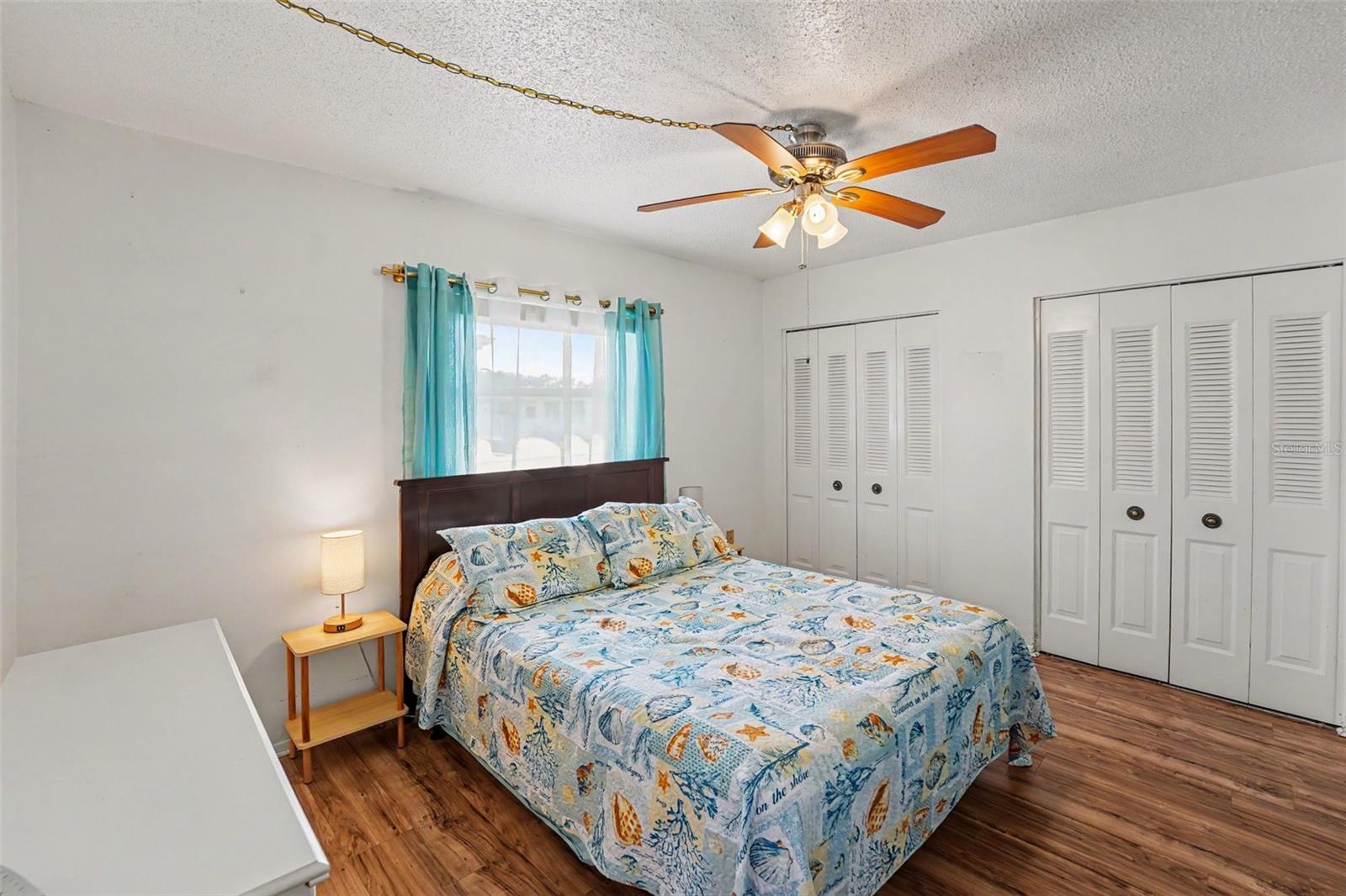Primary Bedroom with LVP Flooring - 3474 101ST TER N, PINELLAS PARK