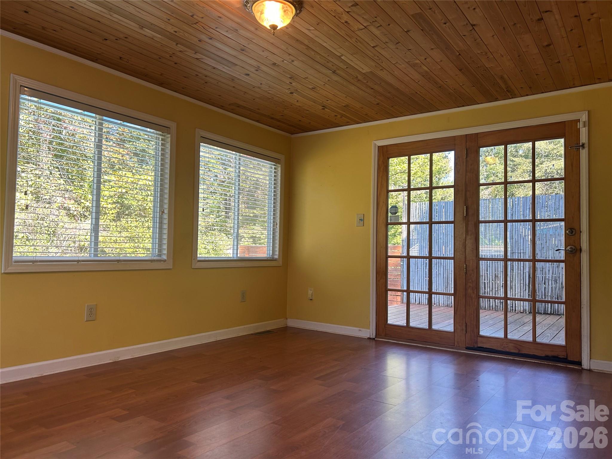 Sunroom leads to deck and pool - 1555 Brookbend Court, Fort Mill