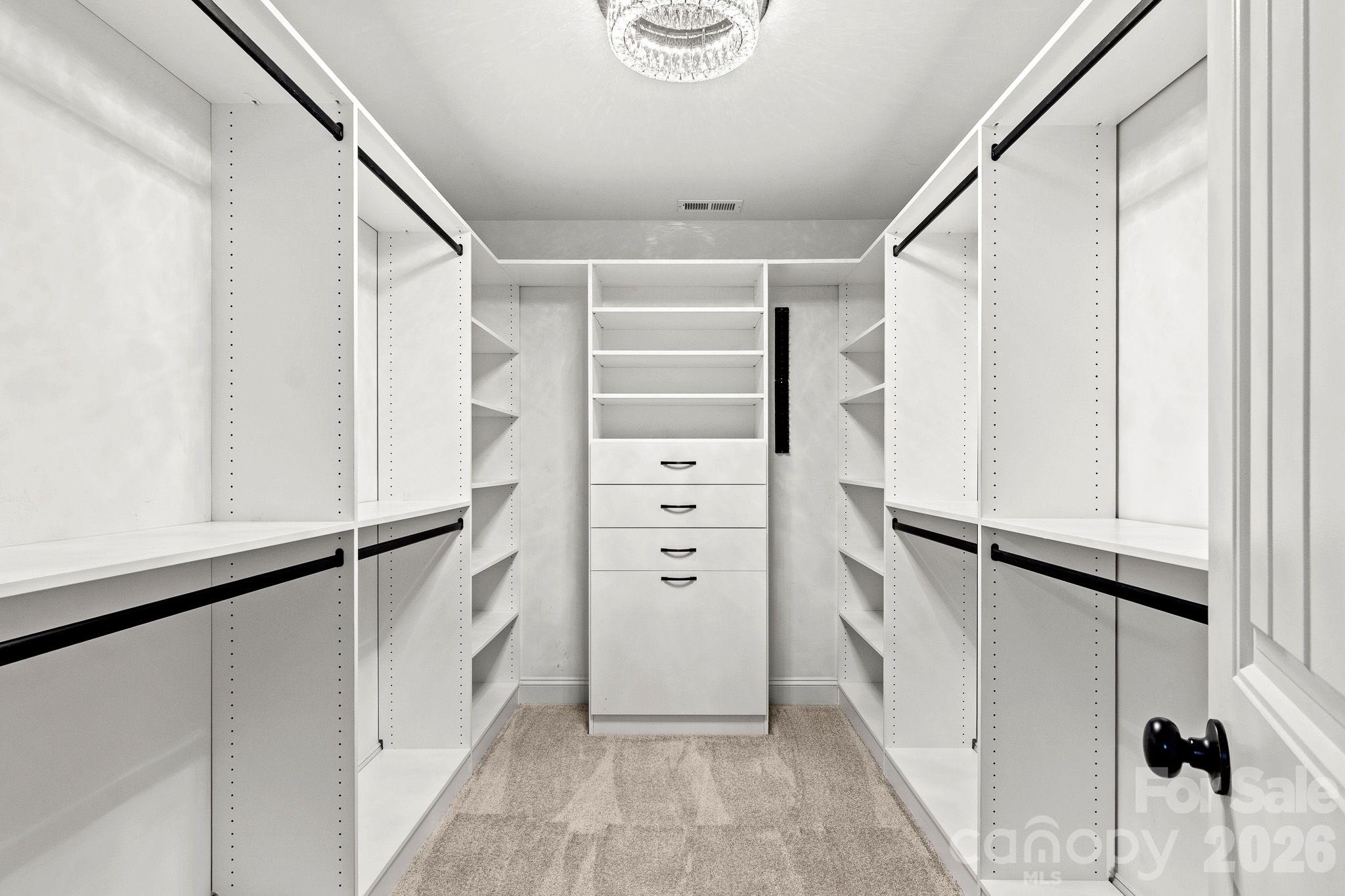 Super spacious primary closet with custom shelving - 862 Tirzah Road, York