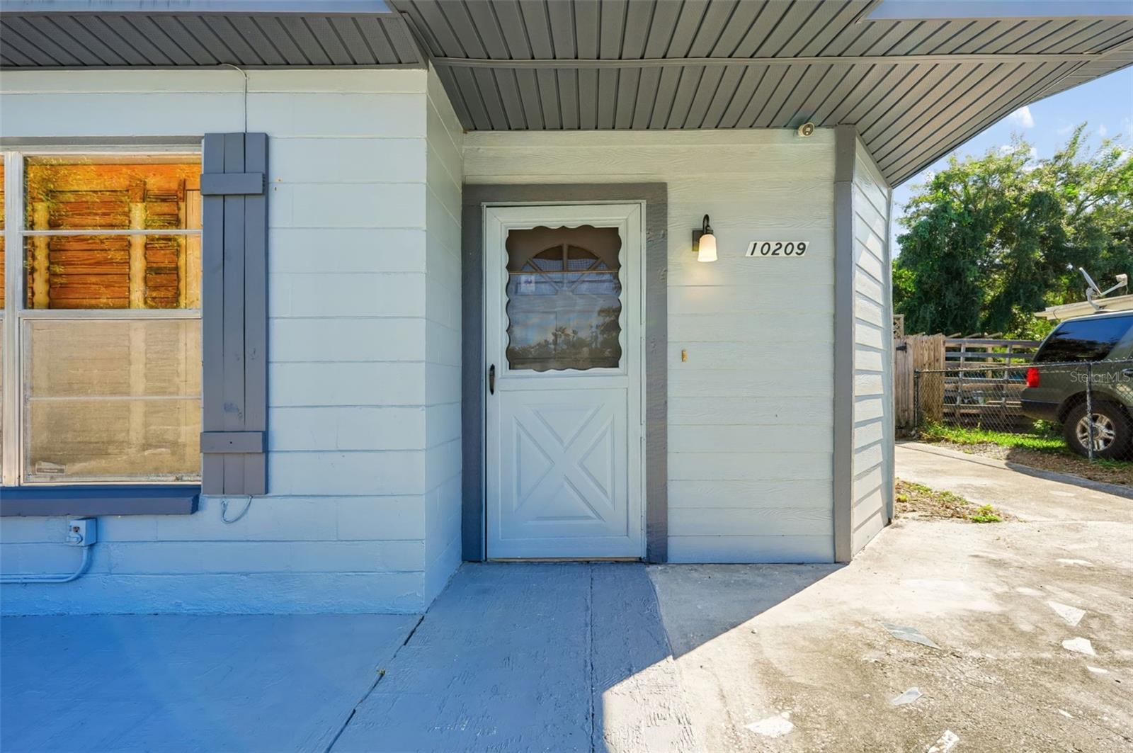 Single Family Residence at 10209 N LOLA ST, TAMPA, photo 2 of 52