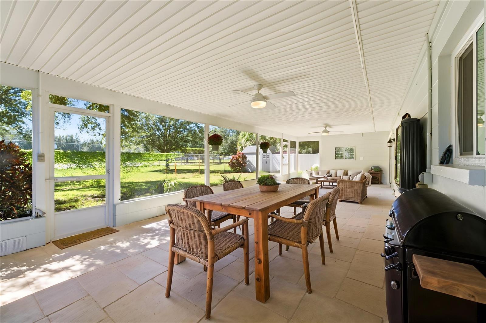 Virtually Staged Rear Porch - 1864 74TH AVE N, ST PETERSBURG