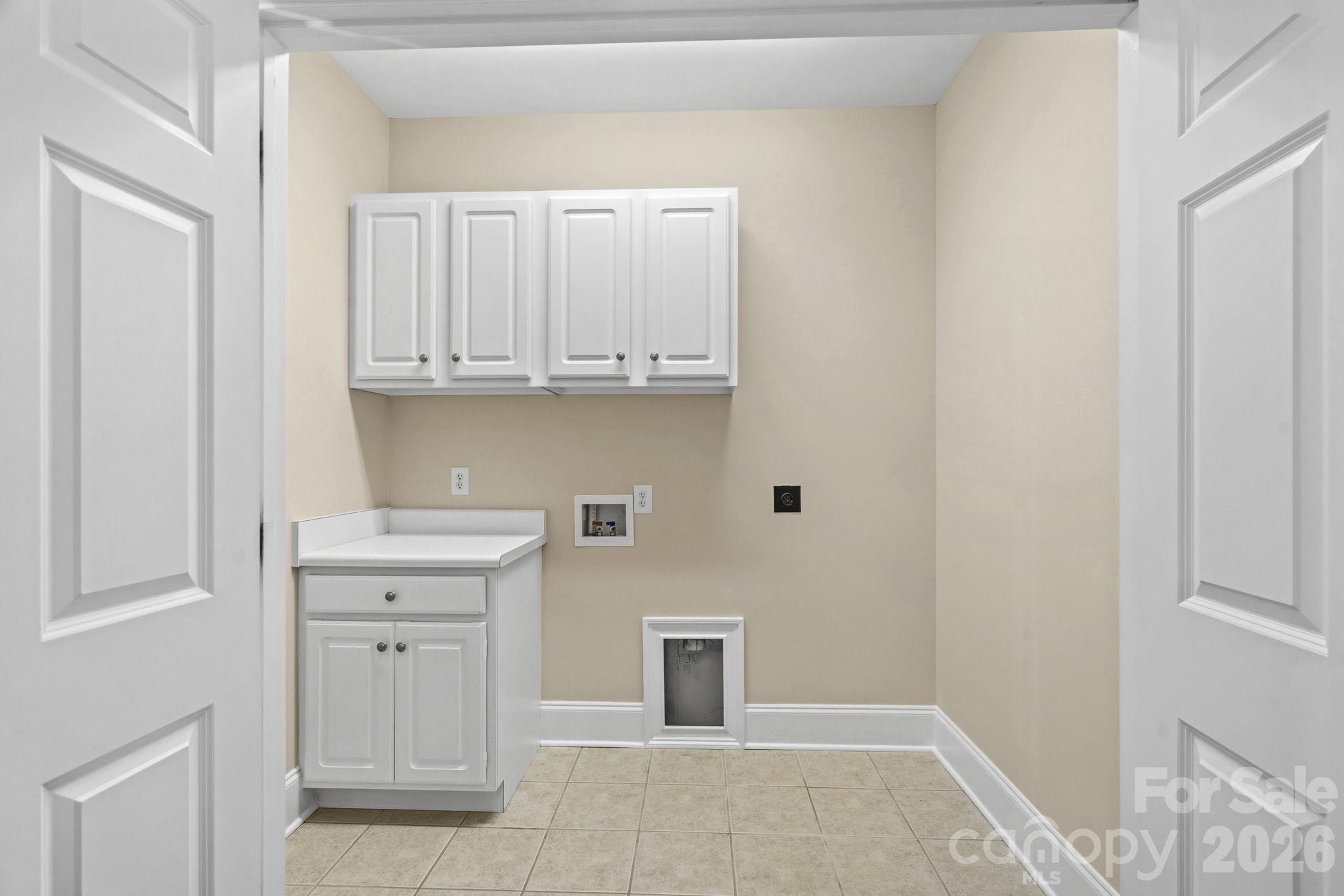 Laundry room - 6830 Louisburg Square Lane, Charlotte