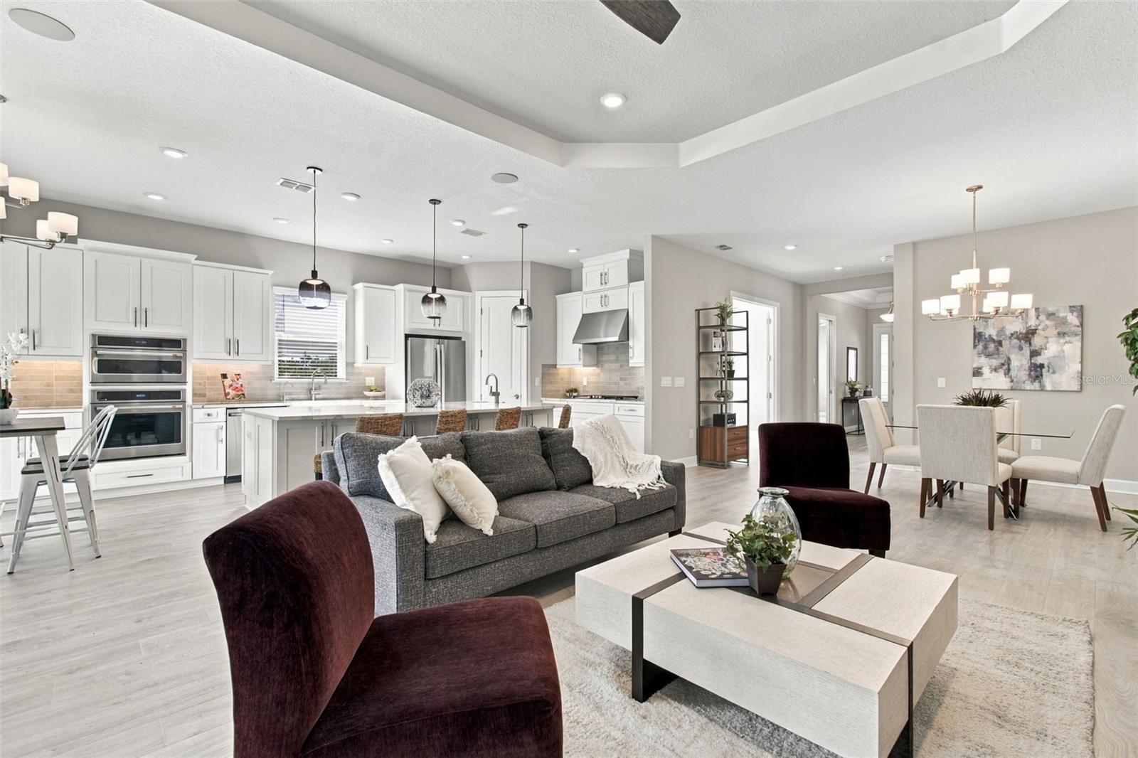 Open plan with combo great room, dining room, kitchen and casual dining area - 29749 CASSINO CT, WESLEY CHAPEL