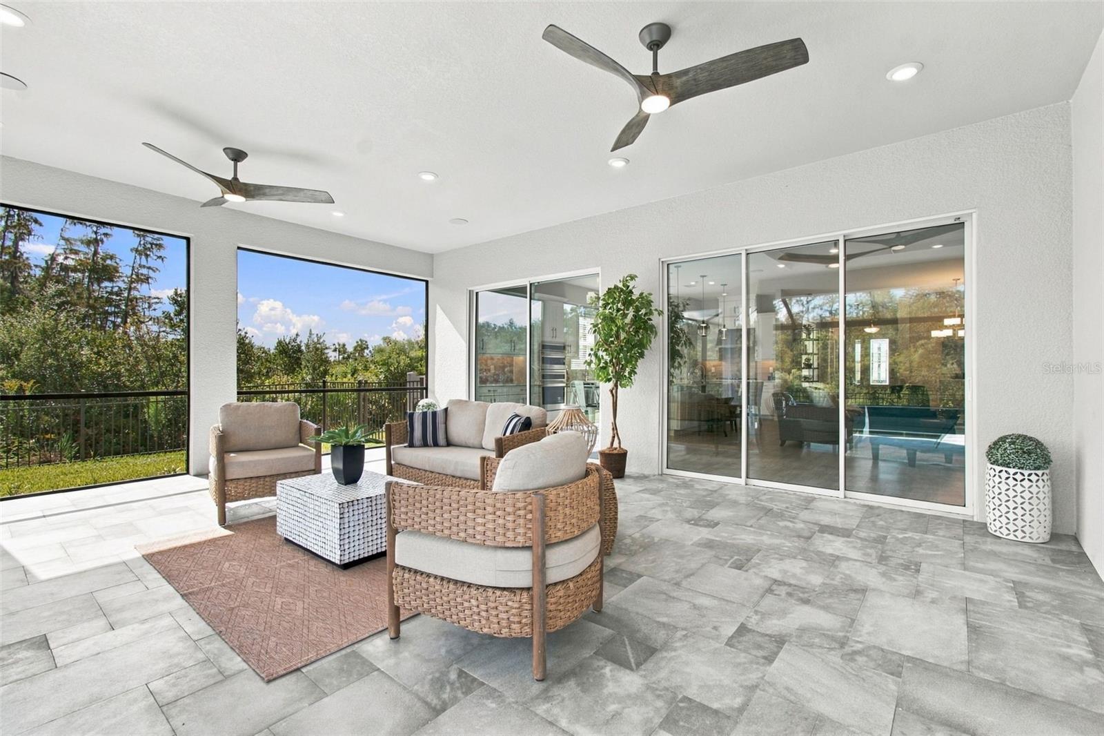 The lanai is over 400 square feet under roof - 29749 CASSINO CT, WESLEY CHAPEL
