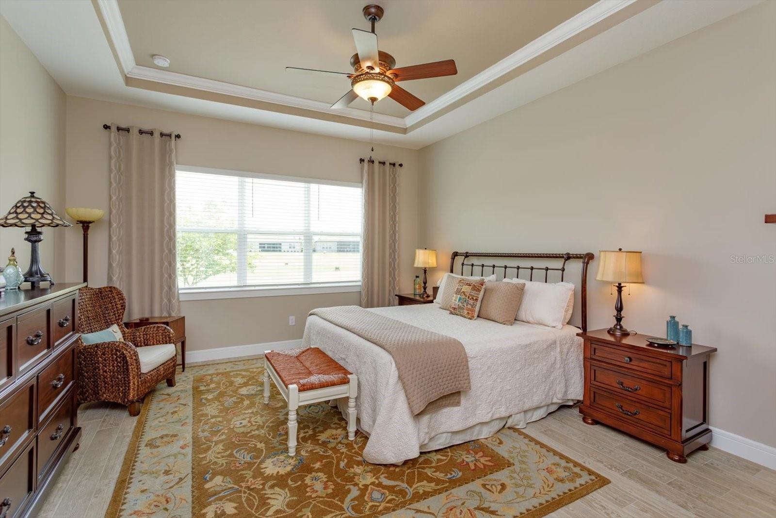 Primary Bedroom with Golf Course View - 5663 SW 92ND AVENUE RD, OCALA
