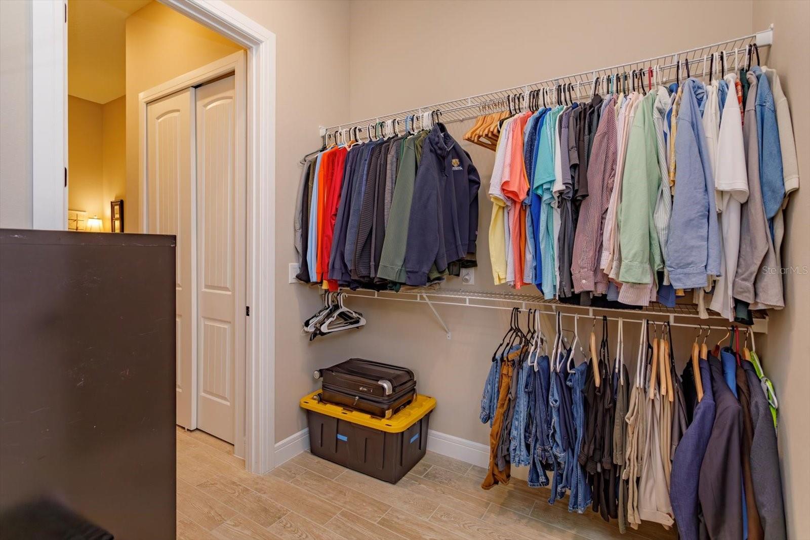 Second Walk-in Closet in the primary Suite with a Walk-Through into the Laundry Room - 5663 SW 92ND AVENUE RD, OCALA