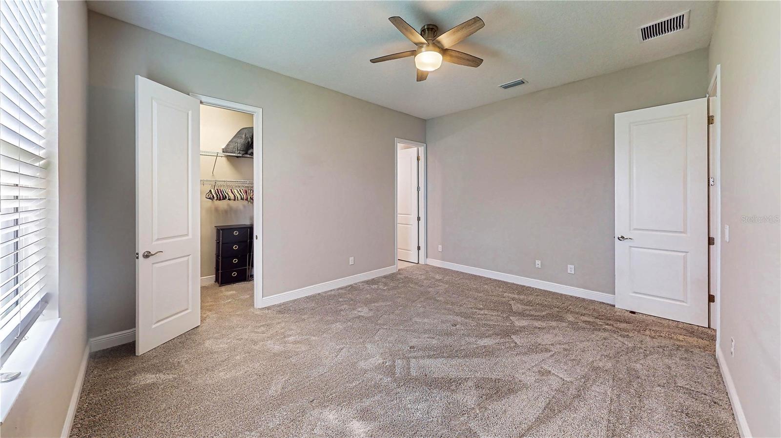 Bedroom 3 with en-suite bathroom and walk-in closet - 3911 GAVIOTA DR, RUSKIN