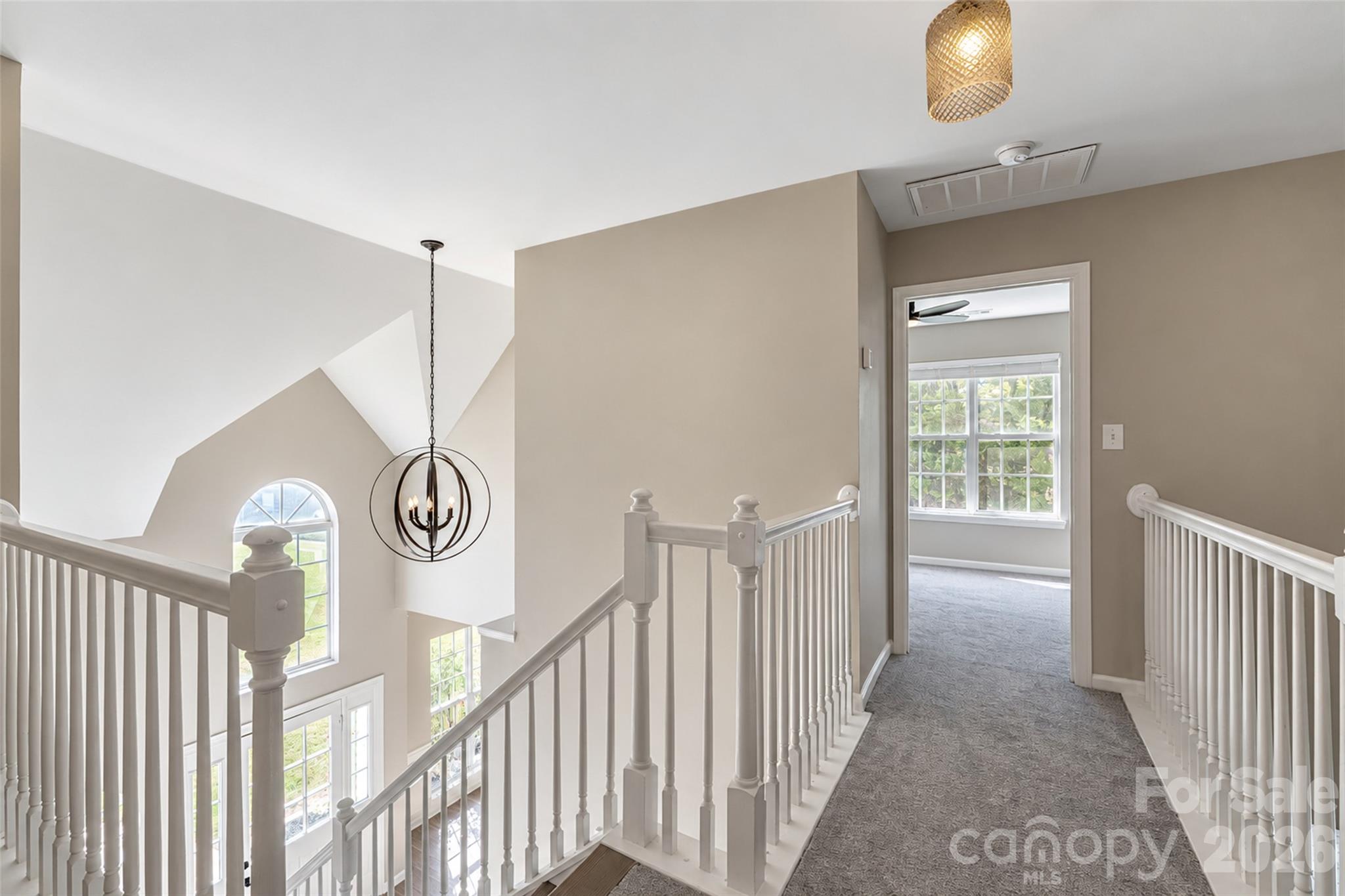 Upper walkway overlooks living room - 118 Breton Court, Mooresville