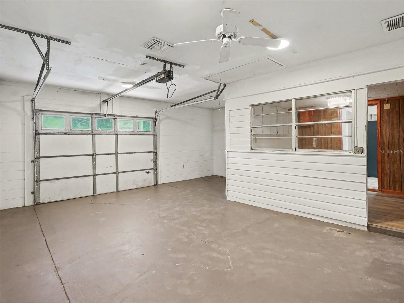 Front load Air conditioned garage - 2417 S MYRTLE AVE, SANFORD