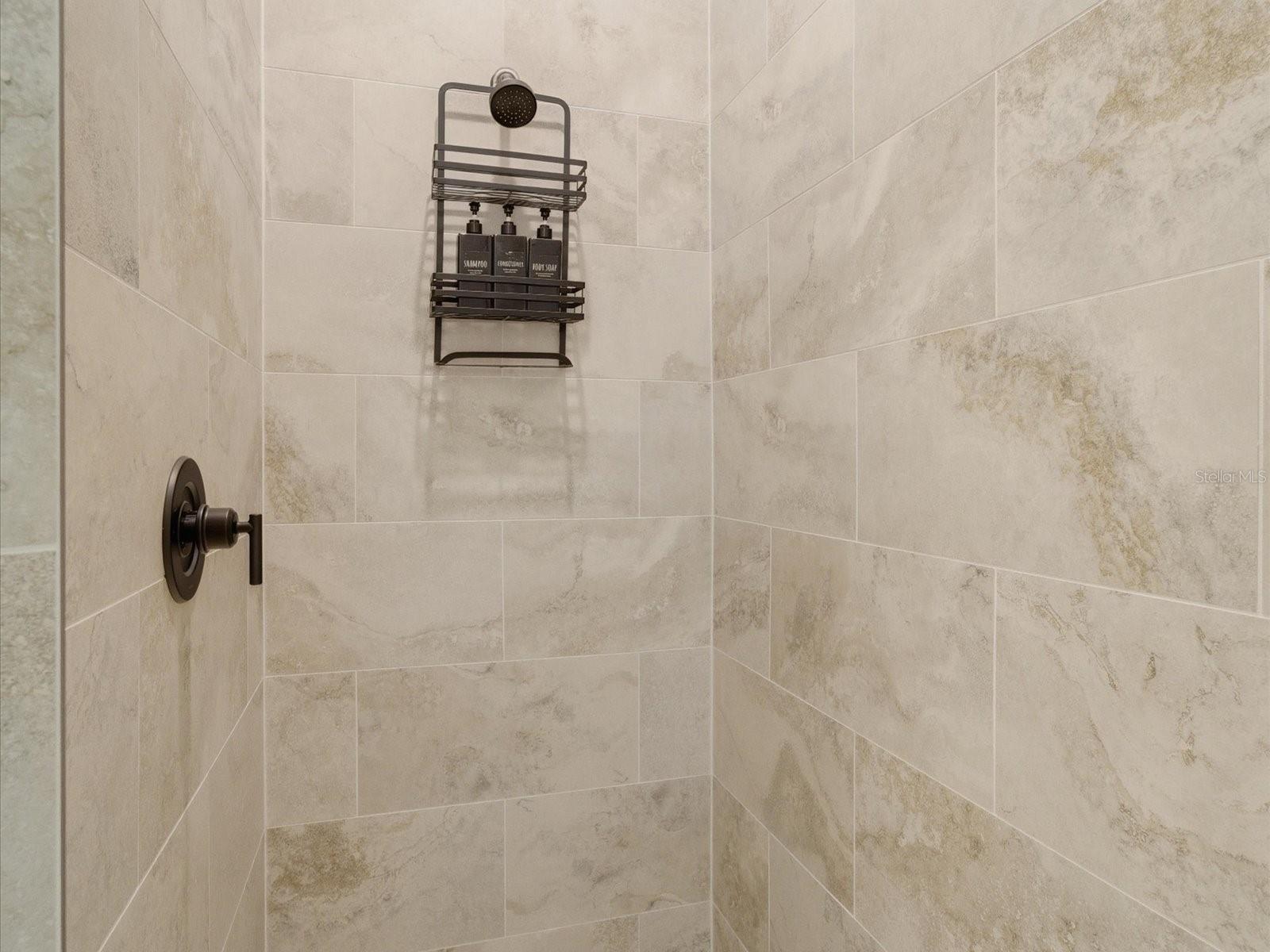 Primary's fully tiled shower - 149 LONG MEADOW LN, ROTONDA WEST