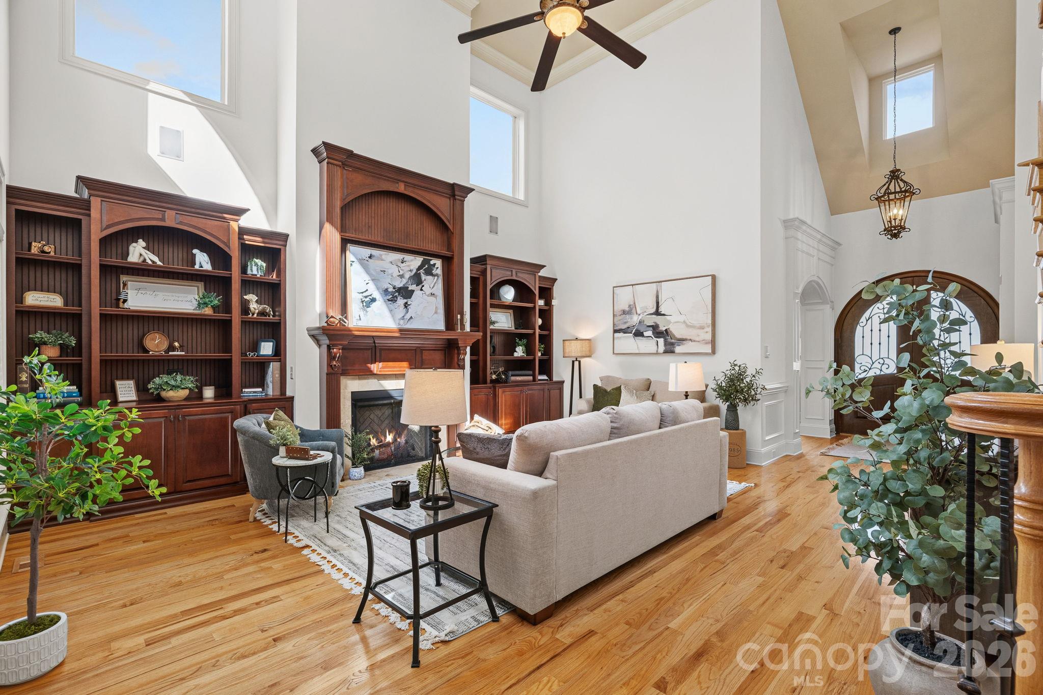 Dramatic and light-filled two story great room with gas fireplace - 108 Lazenby Drive, Fort Mill