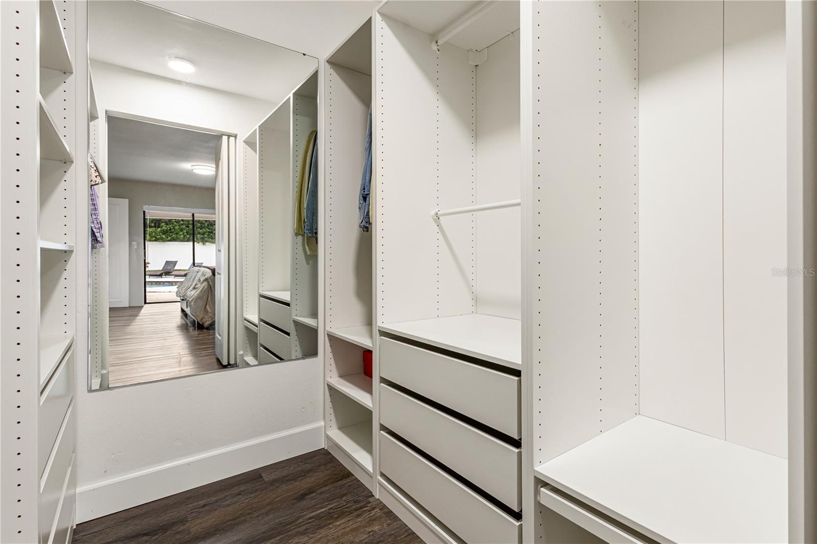 PRIMARY WALK IN CLOSET WITH BUILT INS - 3222 WESSEX WAY, CLEARWATER