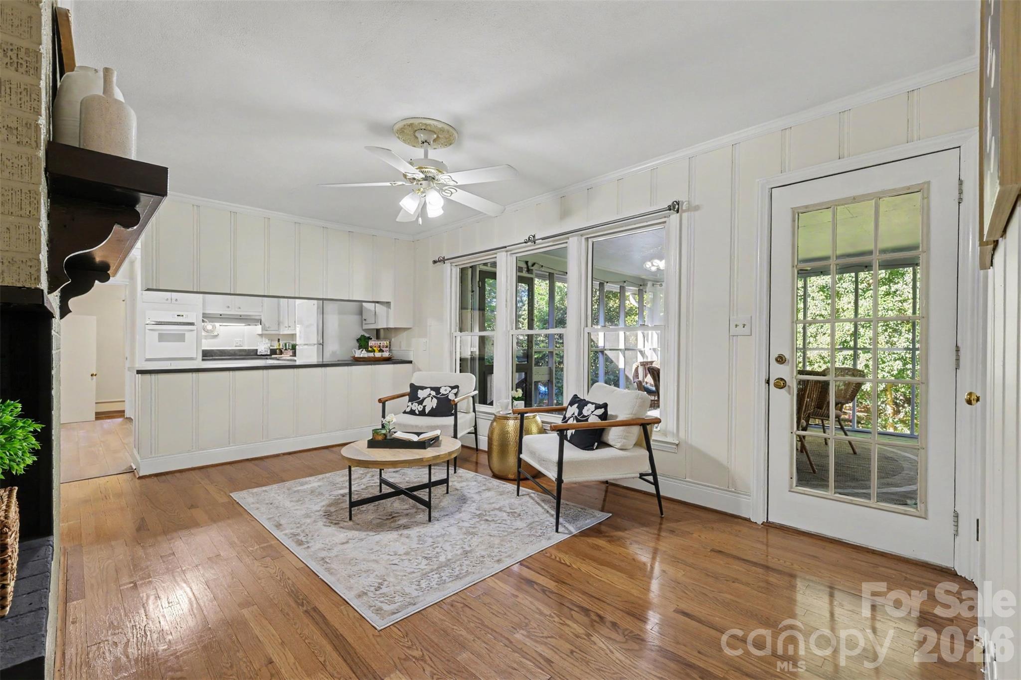 The family room opens to the kitchen and screened porch, making everyday living and entertaining easy. - 407 Pine Street, Fort Mill