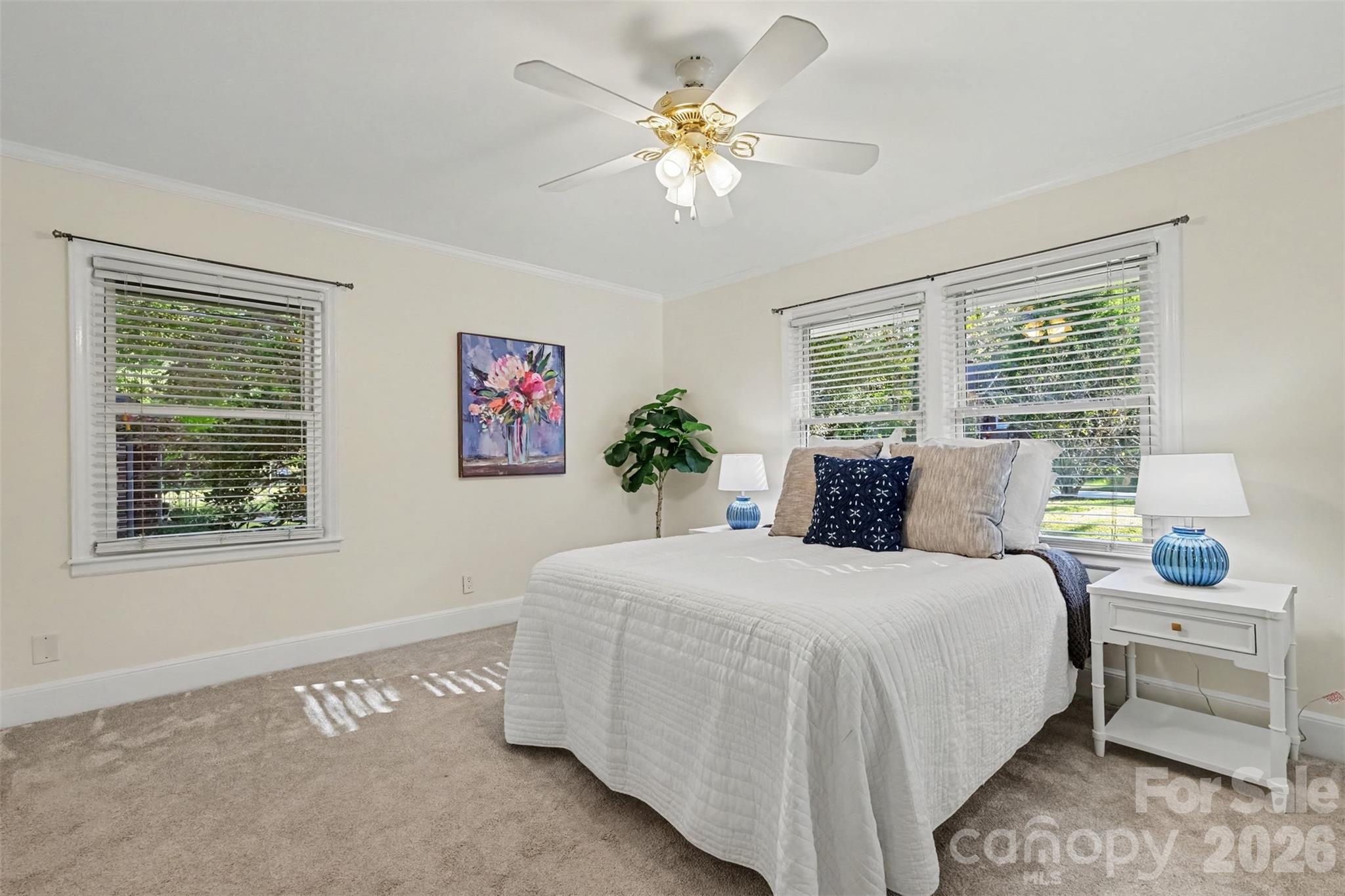 Spacious primary bedroom with soft natural light and plenty of room to relax and unwind. - 407 Pine Street, Fort Mill