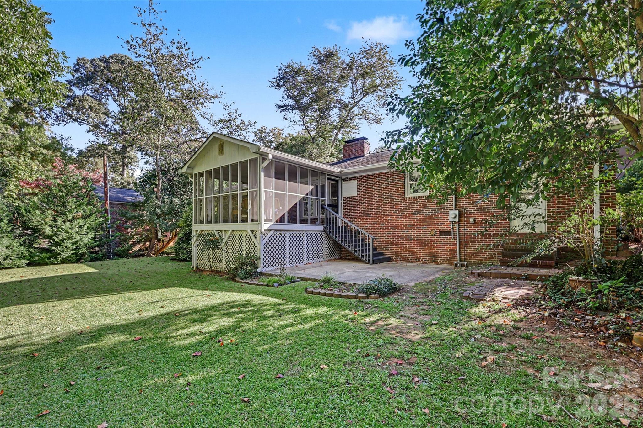 The backyard offers room to relax, entertain, garden, or simply enjoy the outdoors. - 407 Pine Street, Fort Mill
