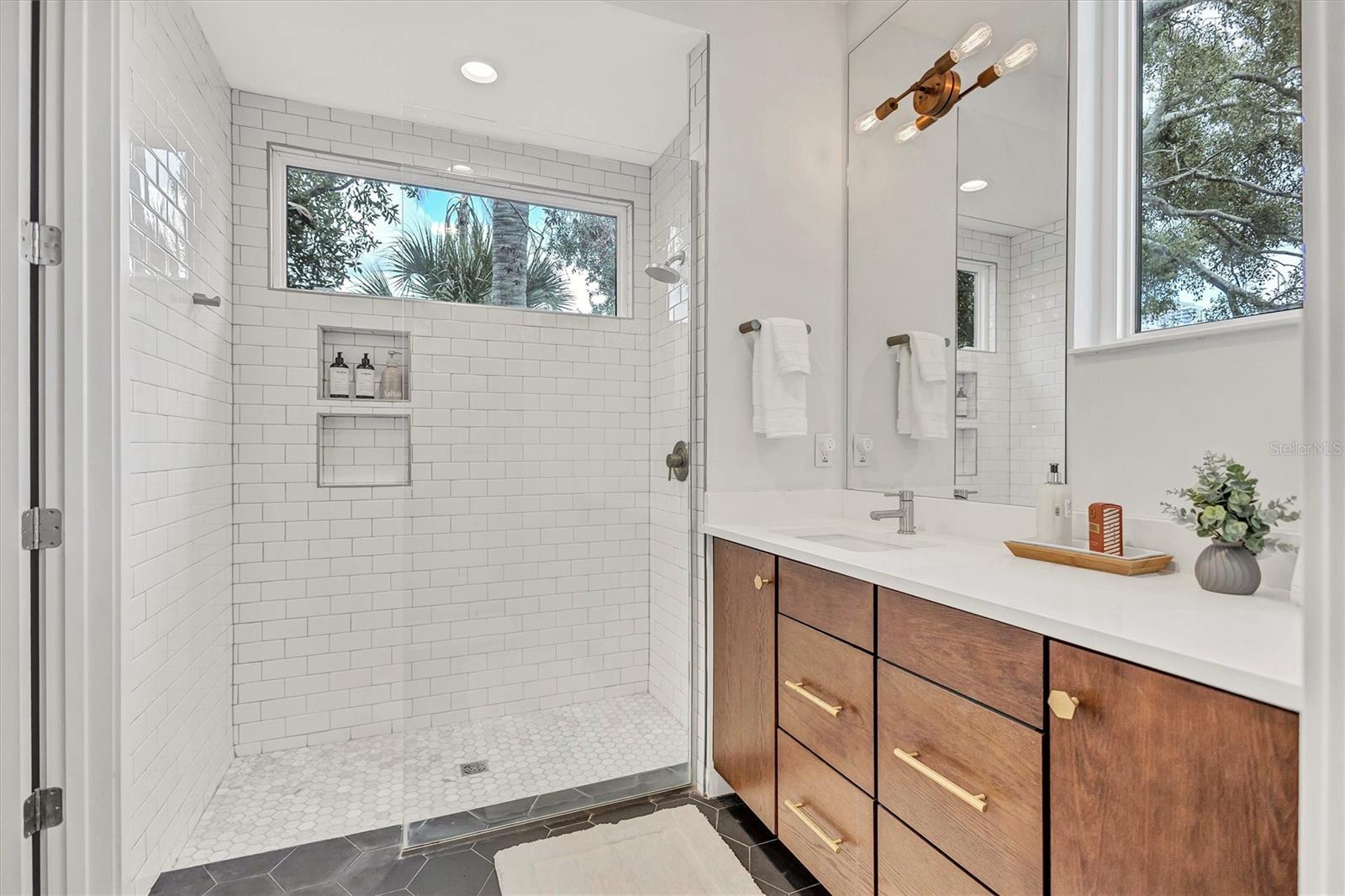 En-suit full bathroom with walk-in shower. - 349 7TH ST S, ST PETERSBURG