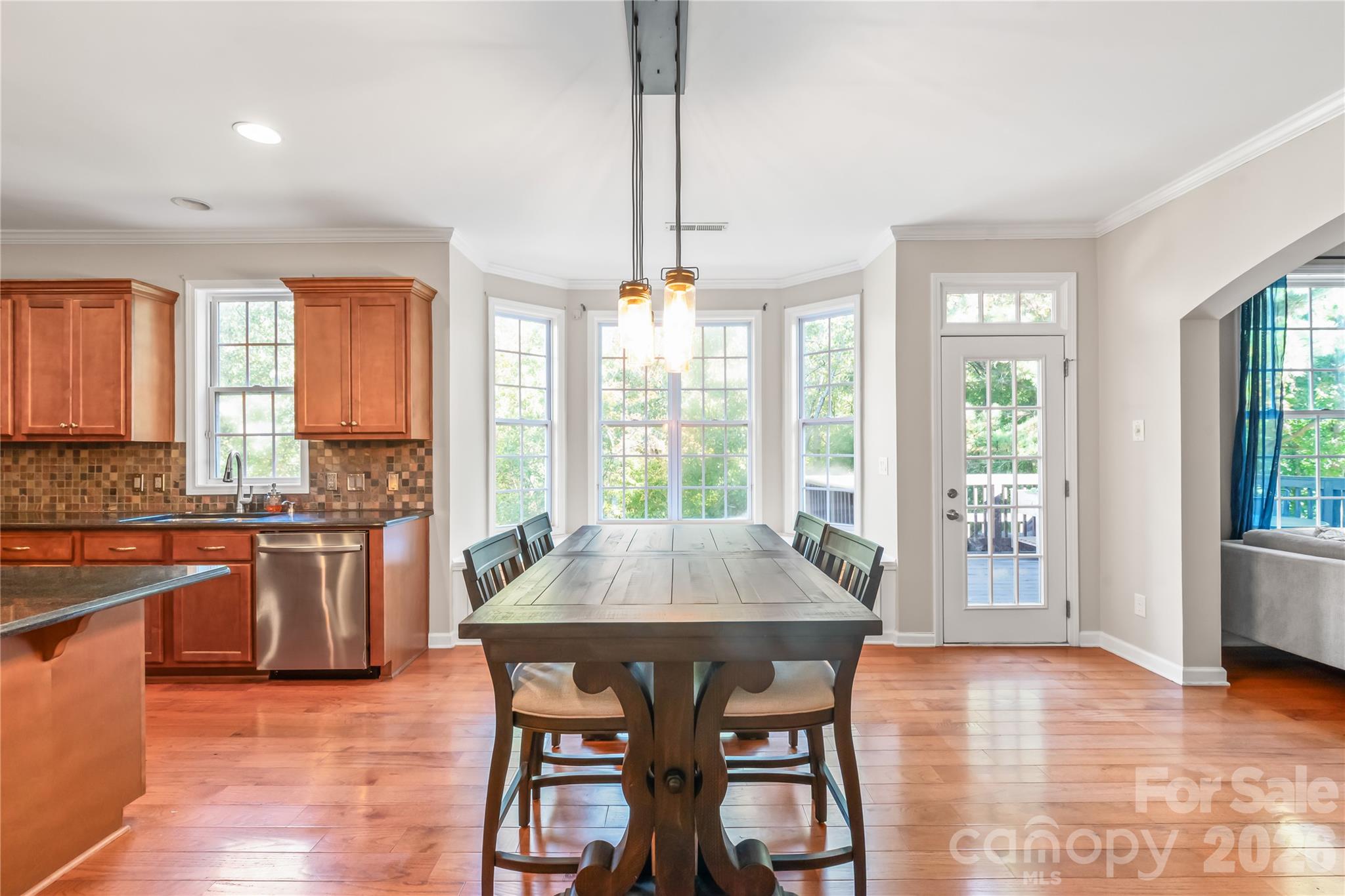 Breakfast area overlooking the bay window with built in window seat - 6482 Chadwell Court, Indian Land