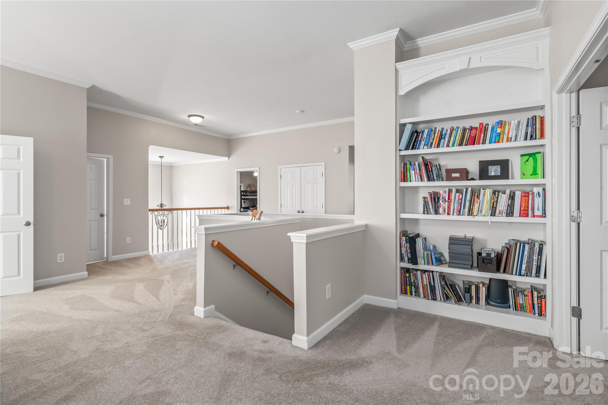 A built in bookshelf adds to the ample storage throughout the property - 6482 Chadwell Court, Indian Land