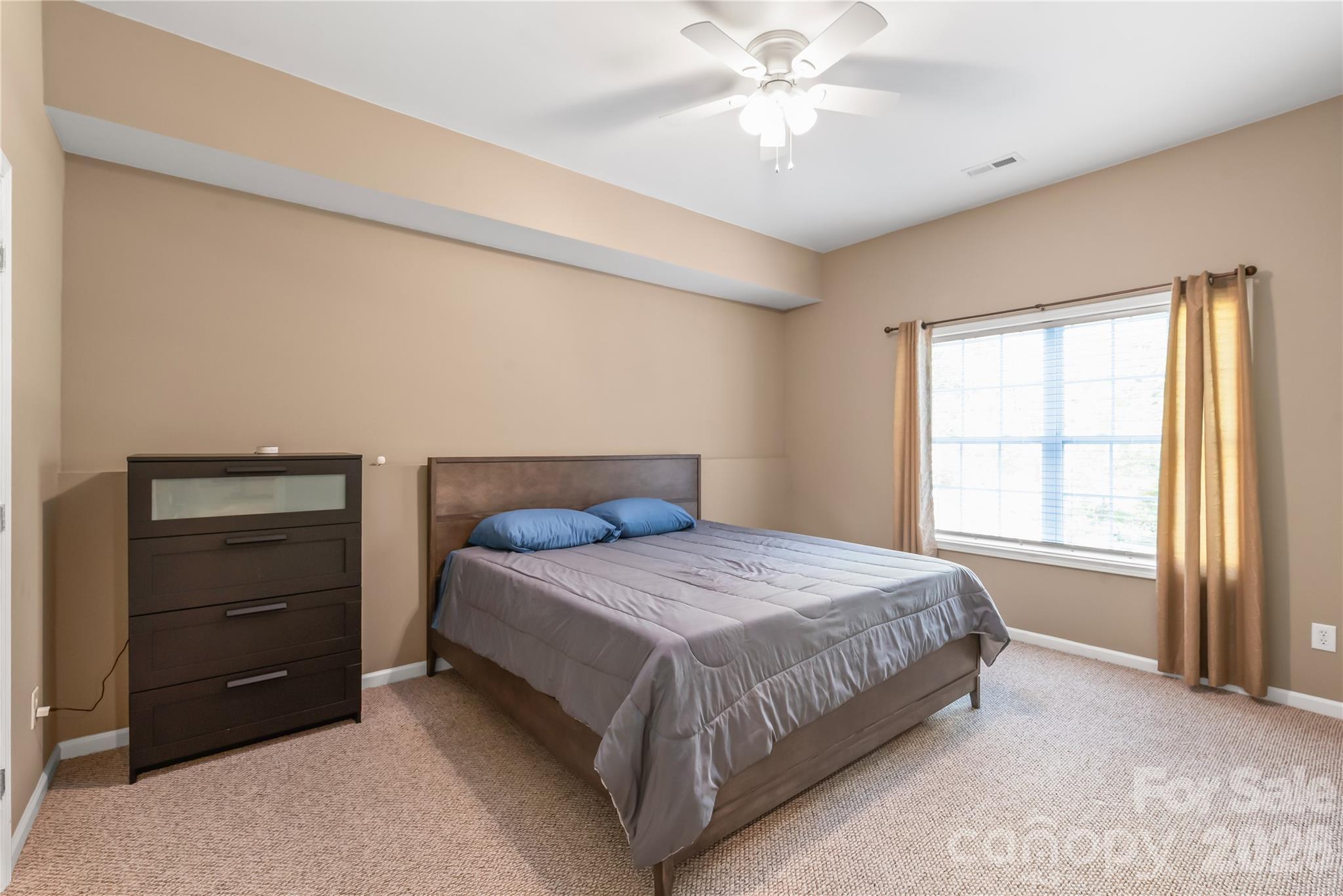 As well as a large bedroom that lets in lots of light - 6482 Chadwell Court, Indian Land