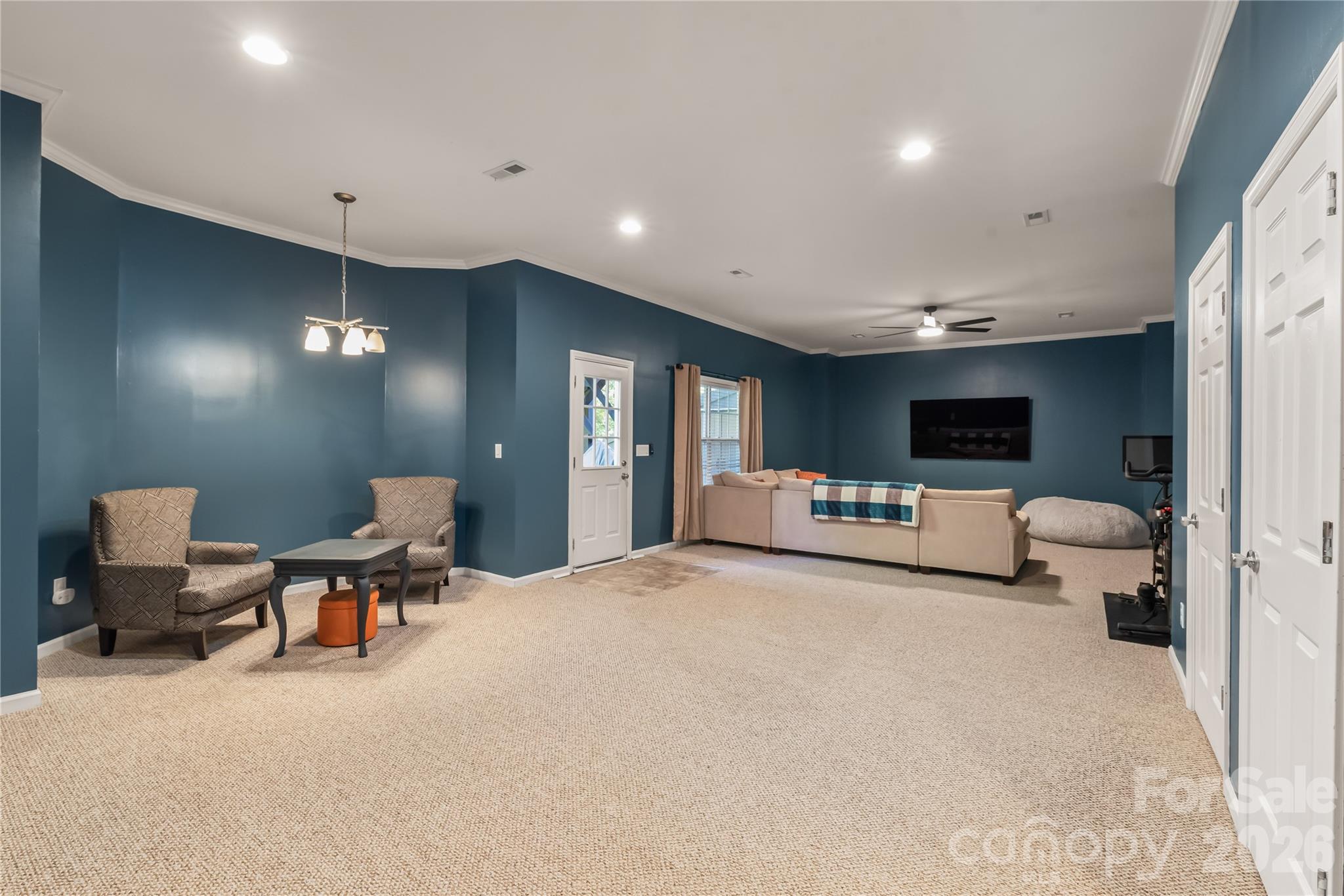 Large flex space in the bedroom, perfect for movie nights, and ample space to add all sorts of recreational activities - 6482 Chadwell Court, Indian Land