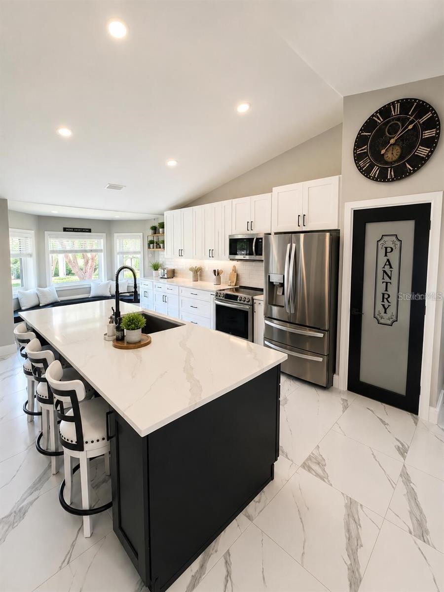 custom kitchen open floor plan - 14 LAMOYNE LN, PALM COAST