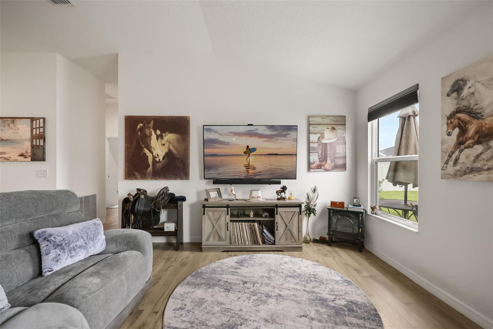 TV stand and wall art does not convey - 1533 LUCA LN, THE VILLAGES