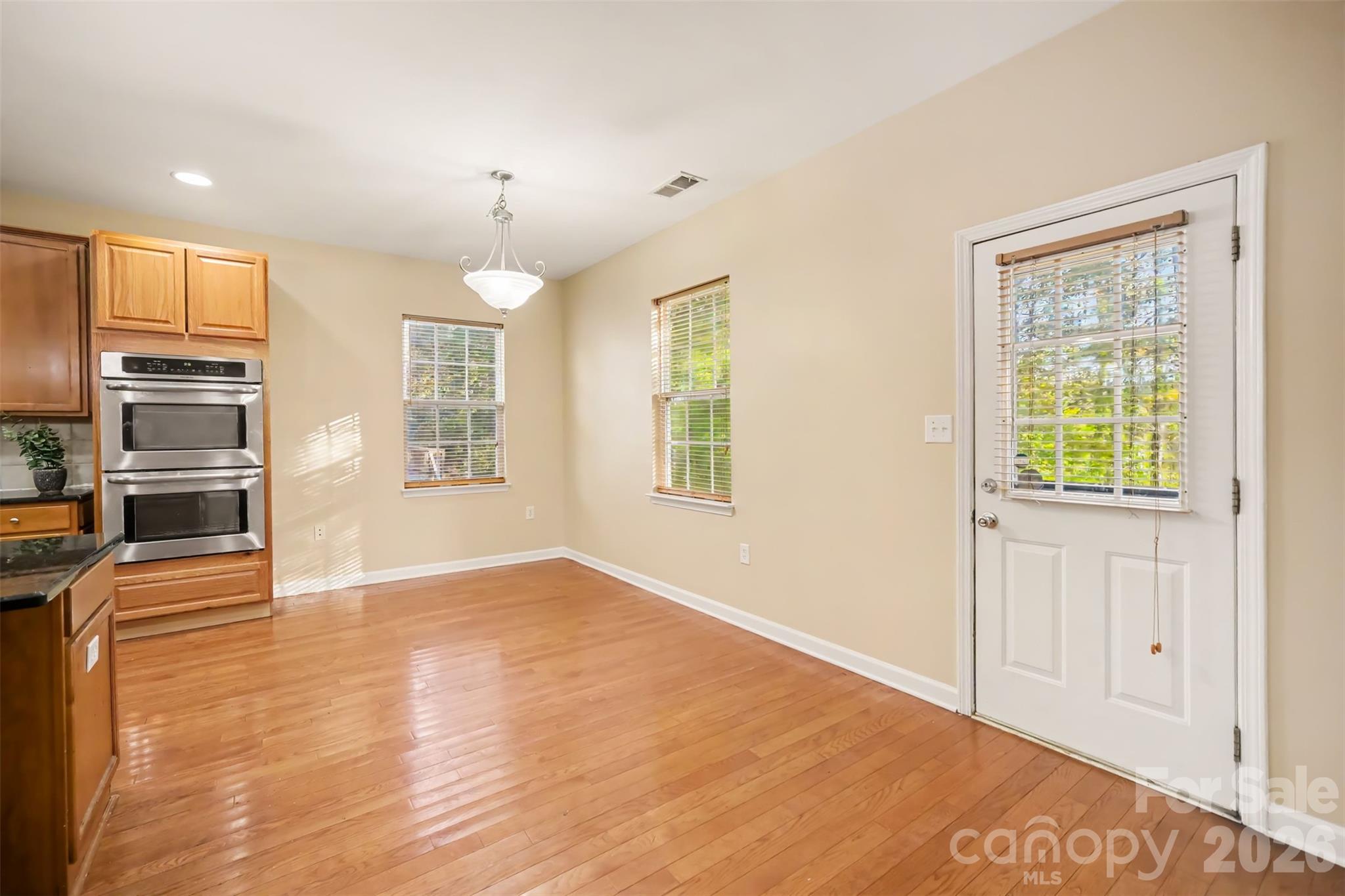 Exit to Deck overlooking woods and Rocky River - 1364 Bottle Brush Lane, Harrisburg