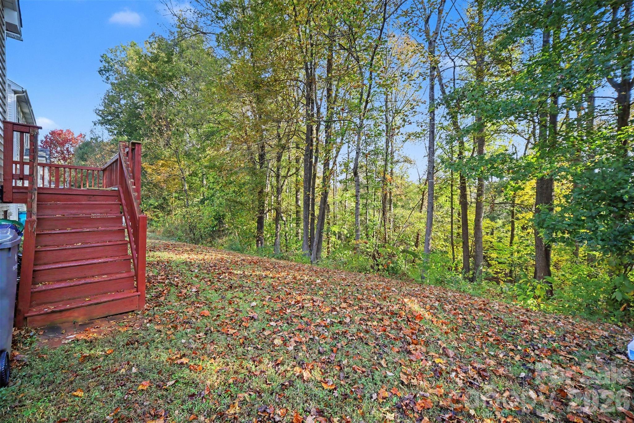 Wooded backyard and view of Rocky River - 1364 Bottle Brush Lane, Harrisburg