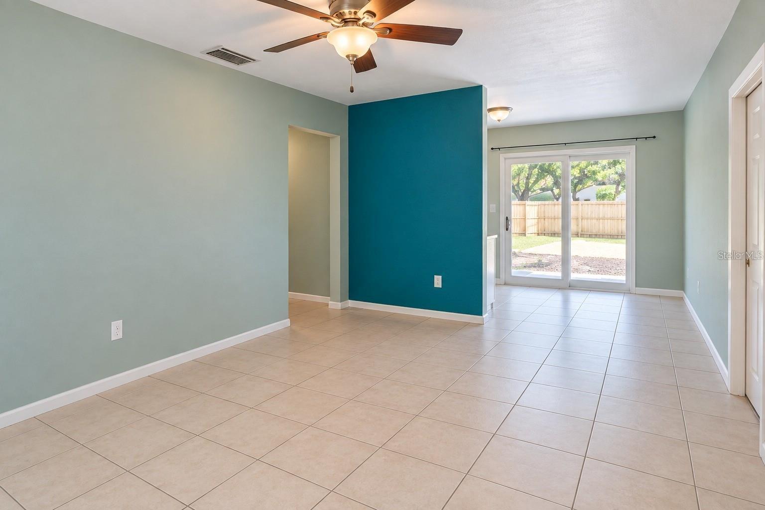 Step inside to a bright and inviting living space with an open feel, perfect for relaxing after a long day or welcoming guests. - 800 DORADO AVE, ORLANDO
