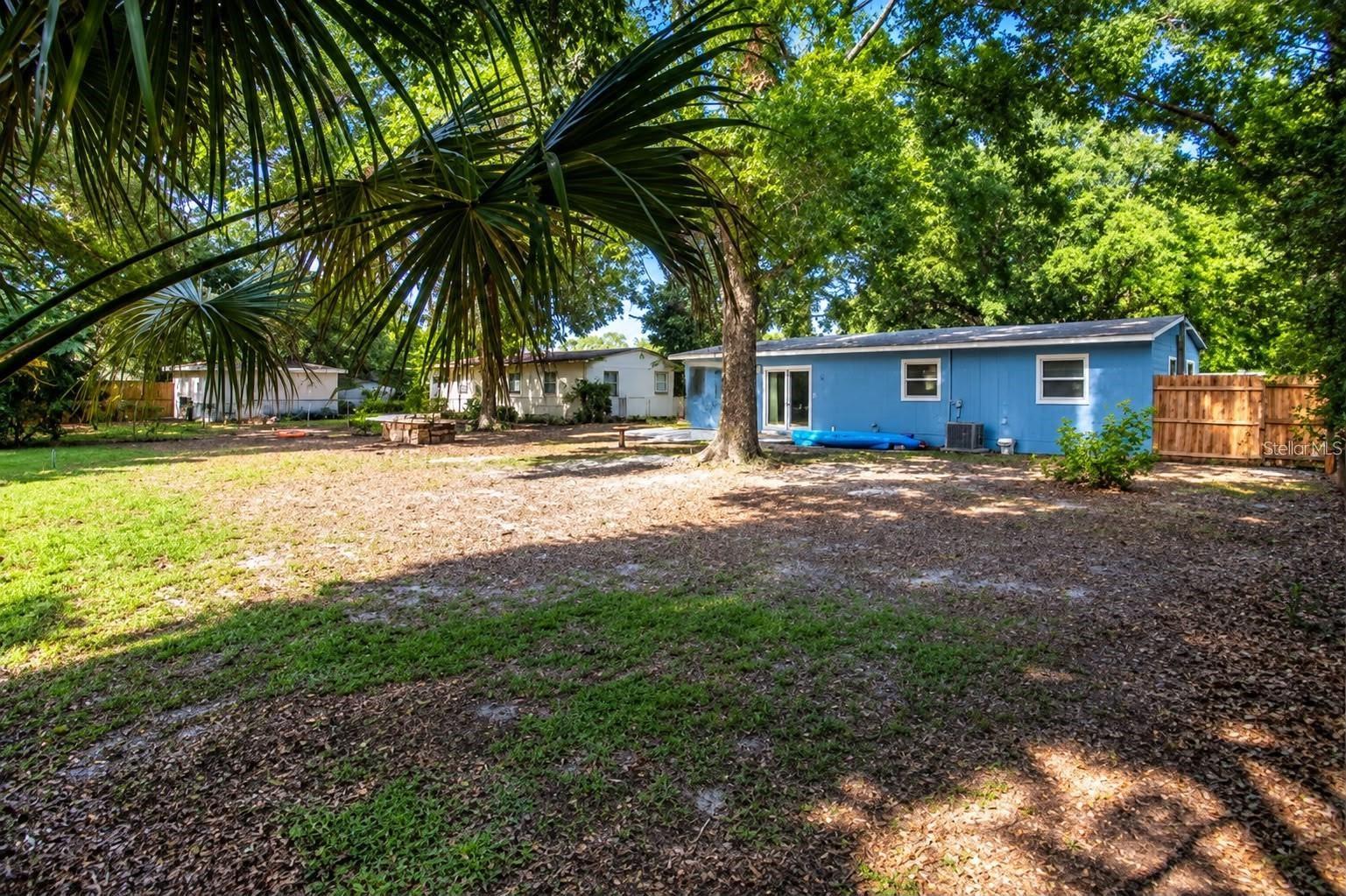 Enjoy your own backyard retreat with lush greenery, natural shade, and outdoor space to make your own. - 800 DORADO AVE, ORLANDO