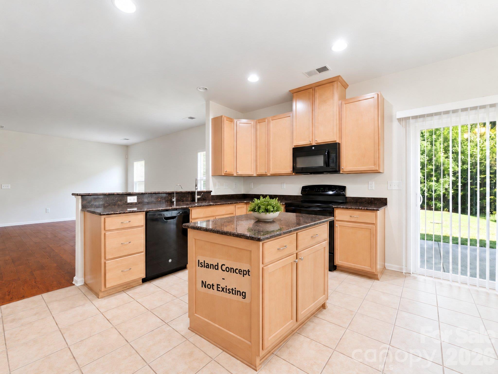 Kitchen island concept: Island digitally added for illustration only. The island does not exist and is not included in the sale. A kitchen photo without the island is also provided. - 3341 Linetender Drive, Davidson