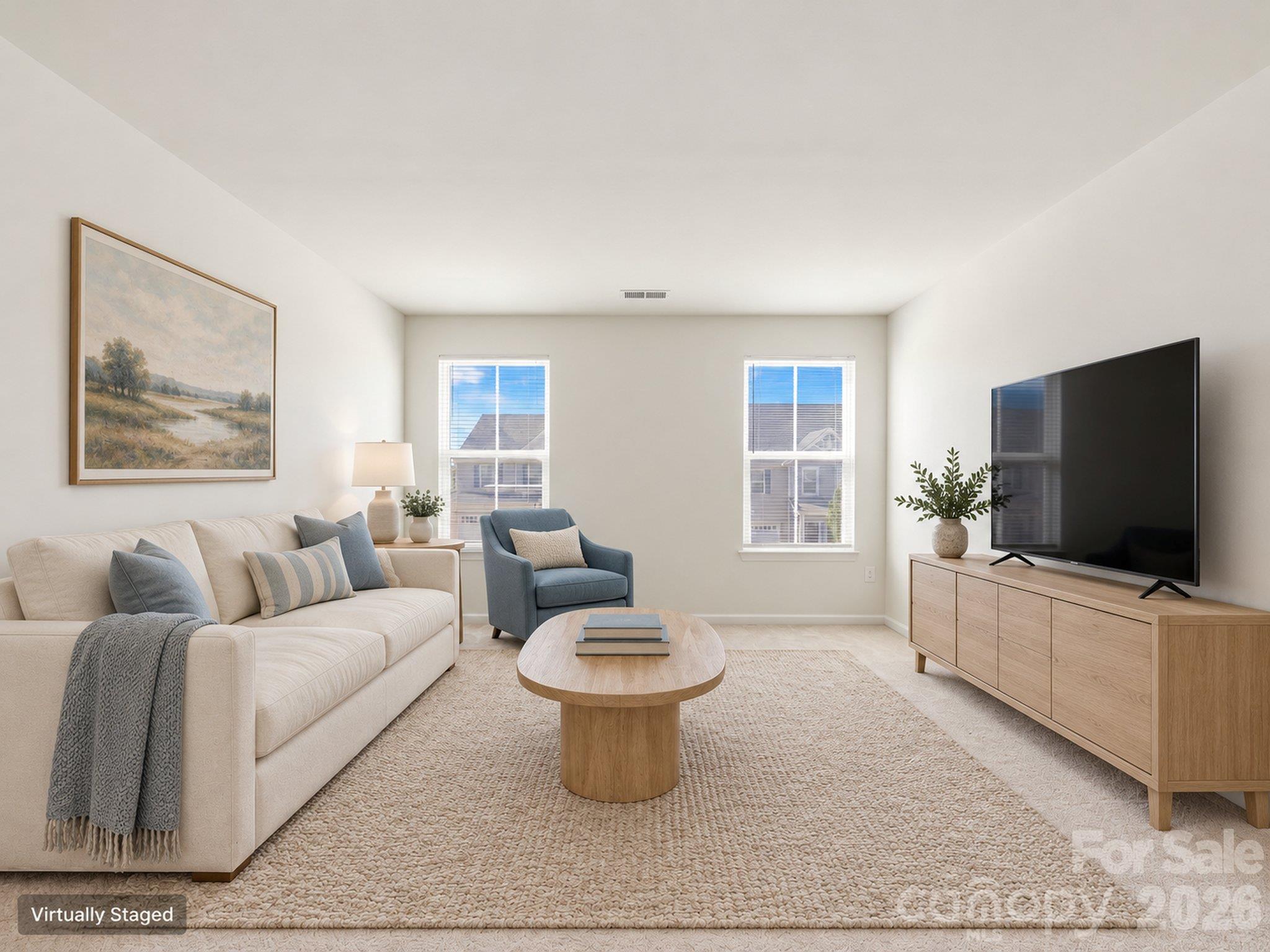 Virtually staged upstairs loft illustrates one option for a second living area or media space. Furnishings and décor digitally added. - 3341 Linetender Drive, Davidson