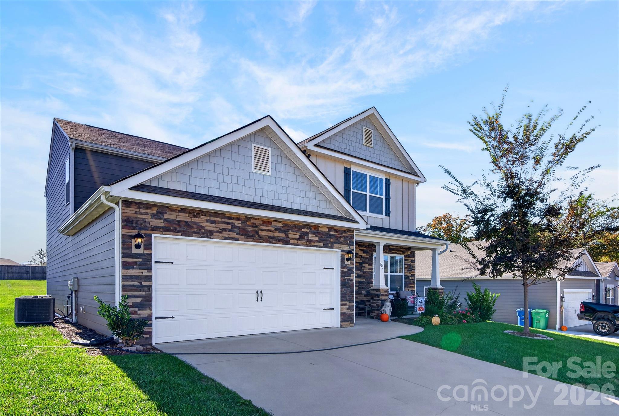 Single Family Residence at 313 Tavernier Lane, Candler, photo 2 of 37