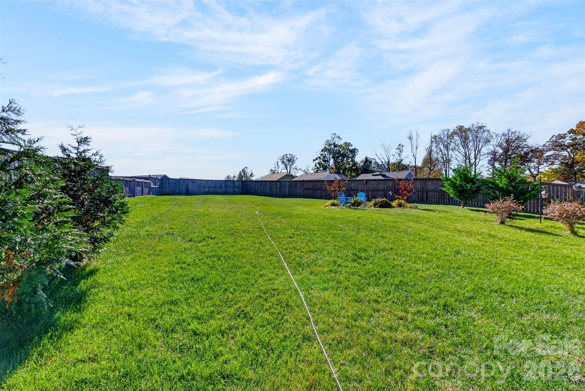 Single Family Residence at 313 Tavernier Lane, Candler, photo 7 of 37
