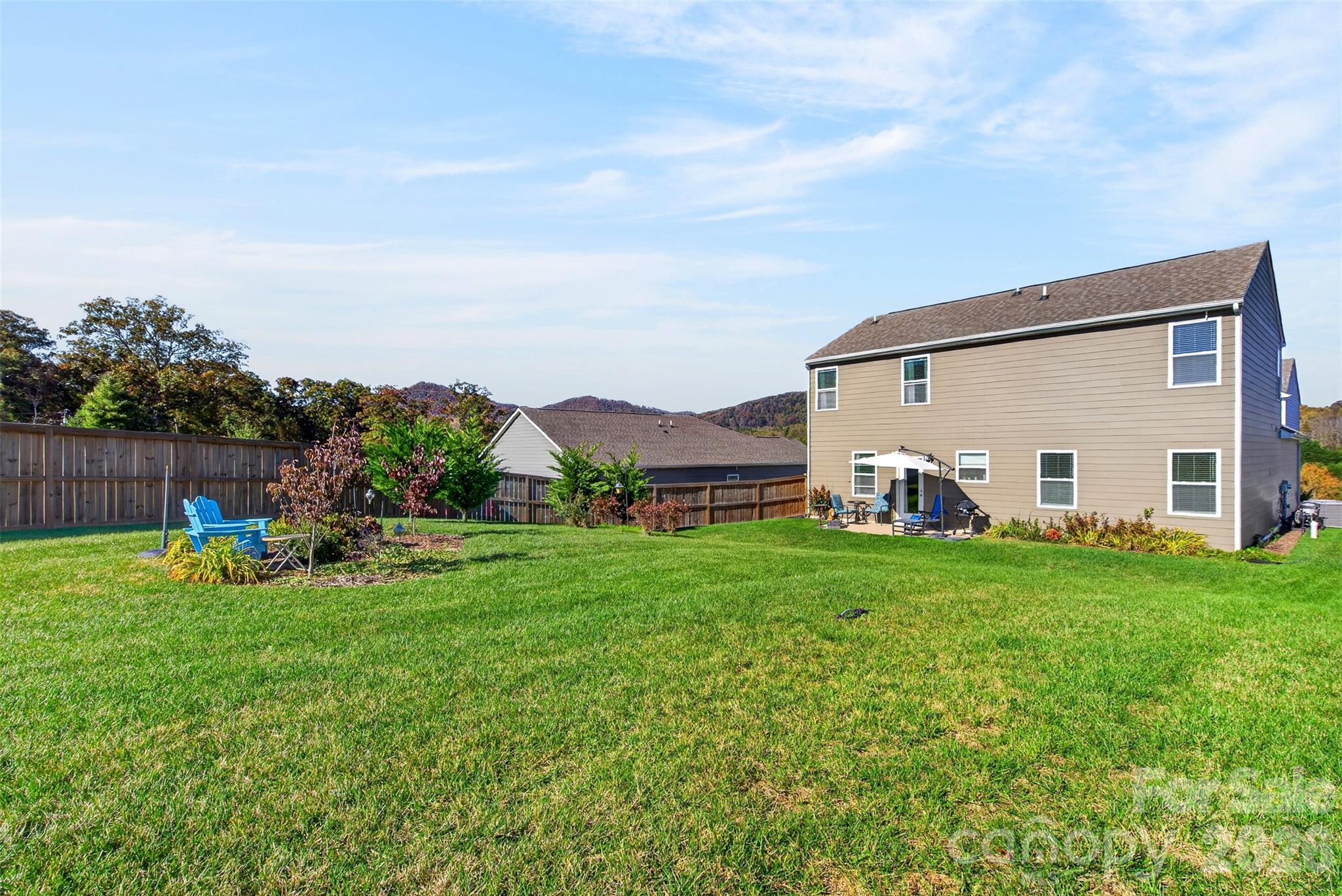 Single Family Residence at 313 Tavernier Lane, Candler, photo 10 of 37